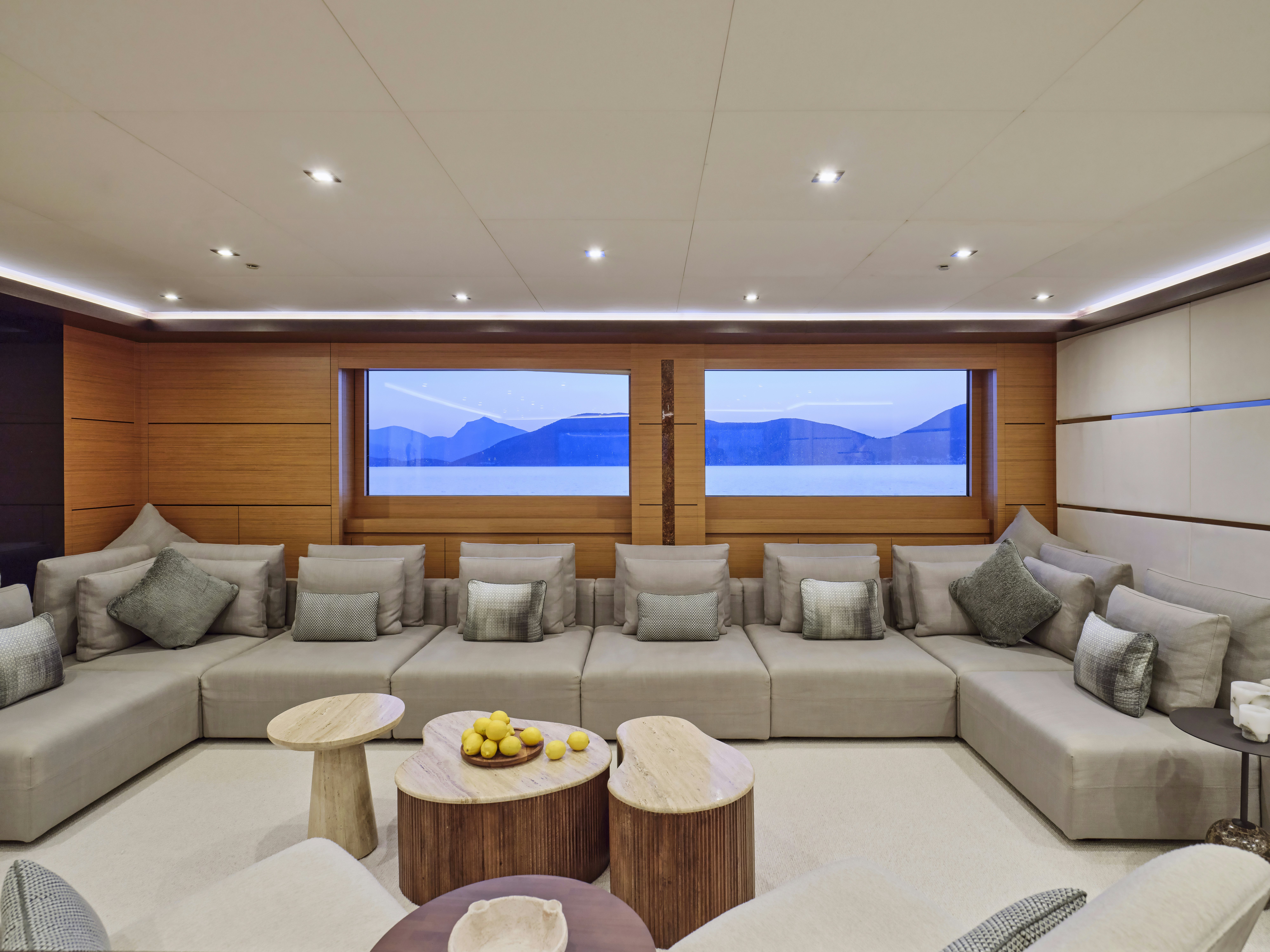 a living room with a large screen aboard PERSEFONI I Yacht for Charter