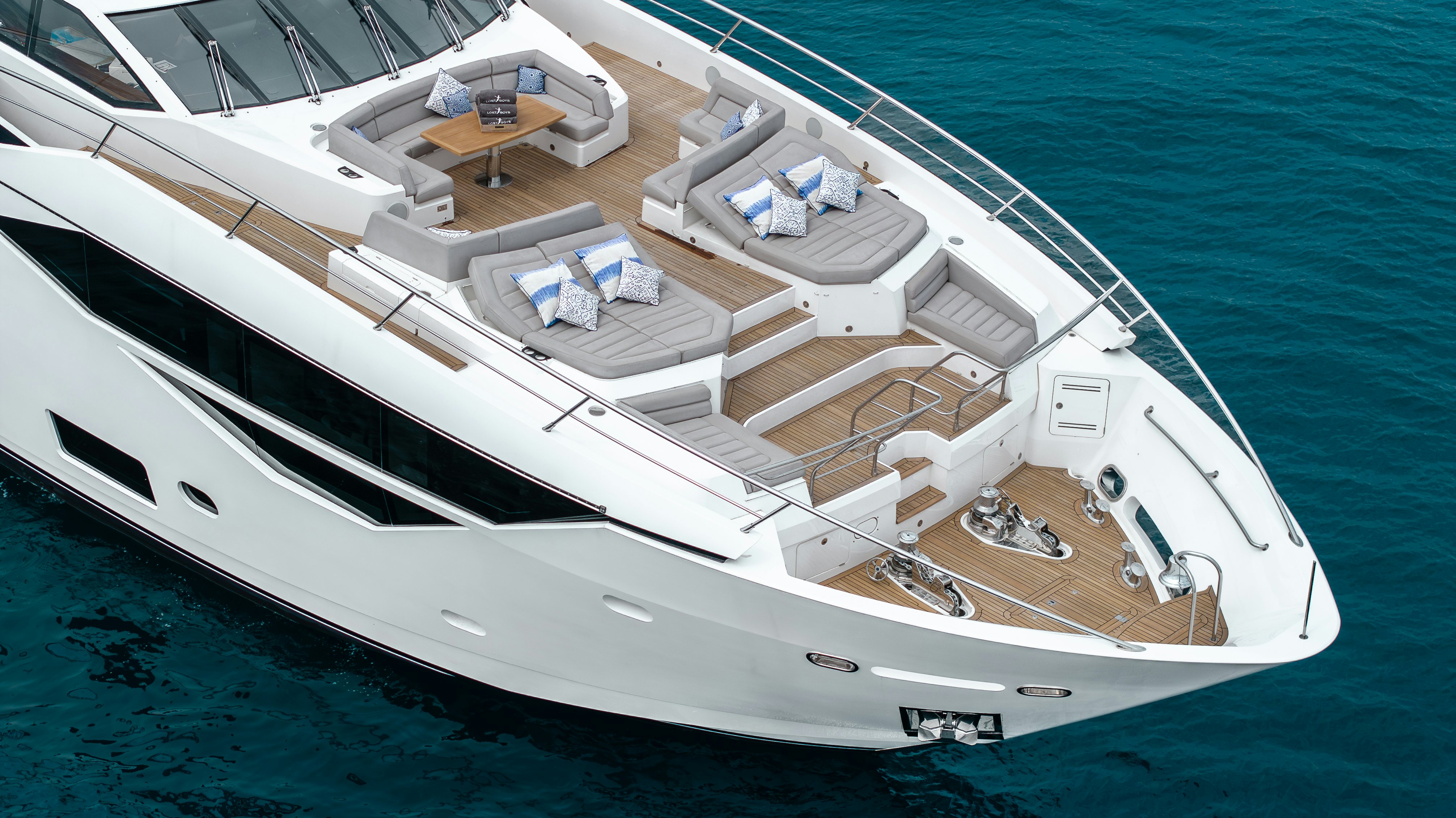 a white boat on the water aboard LOST BOYS Yacht for Sale