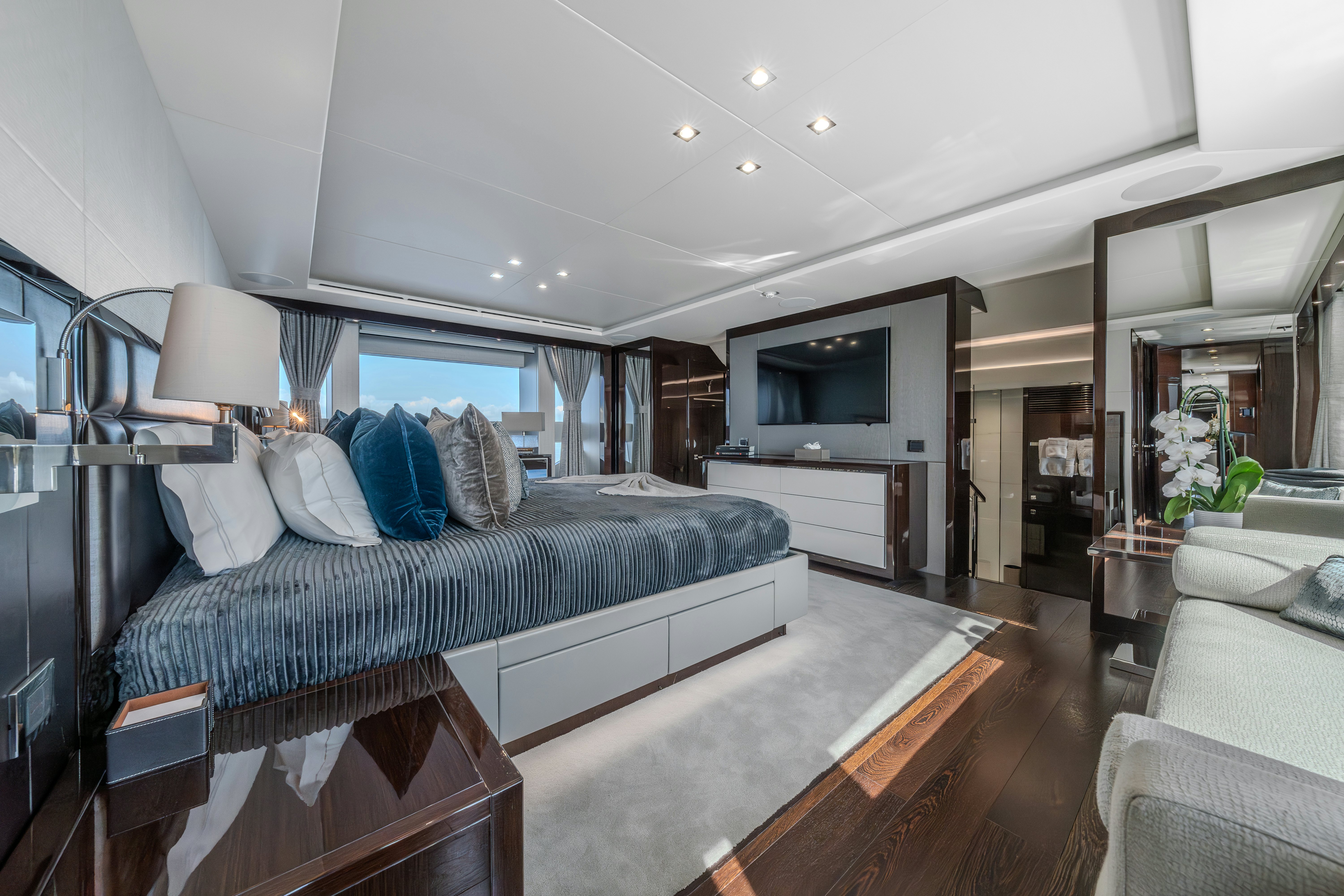 a large bedroom with a large bed aboard LOST BOYS Yacht for Sale