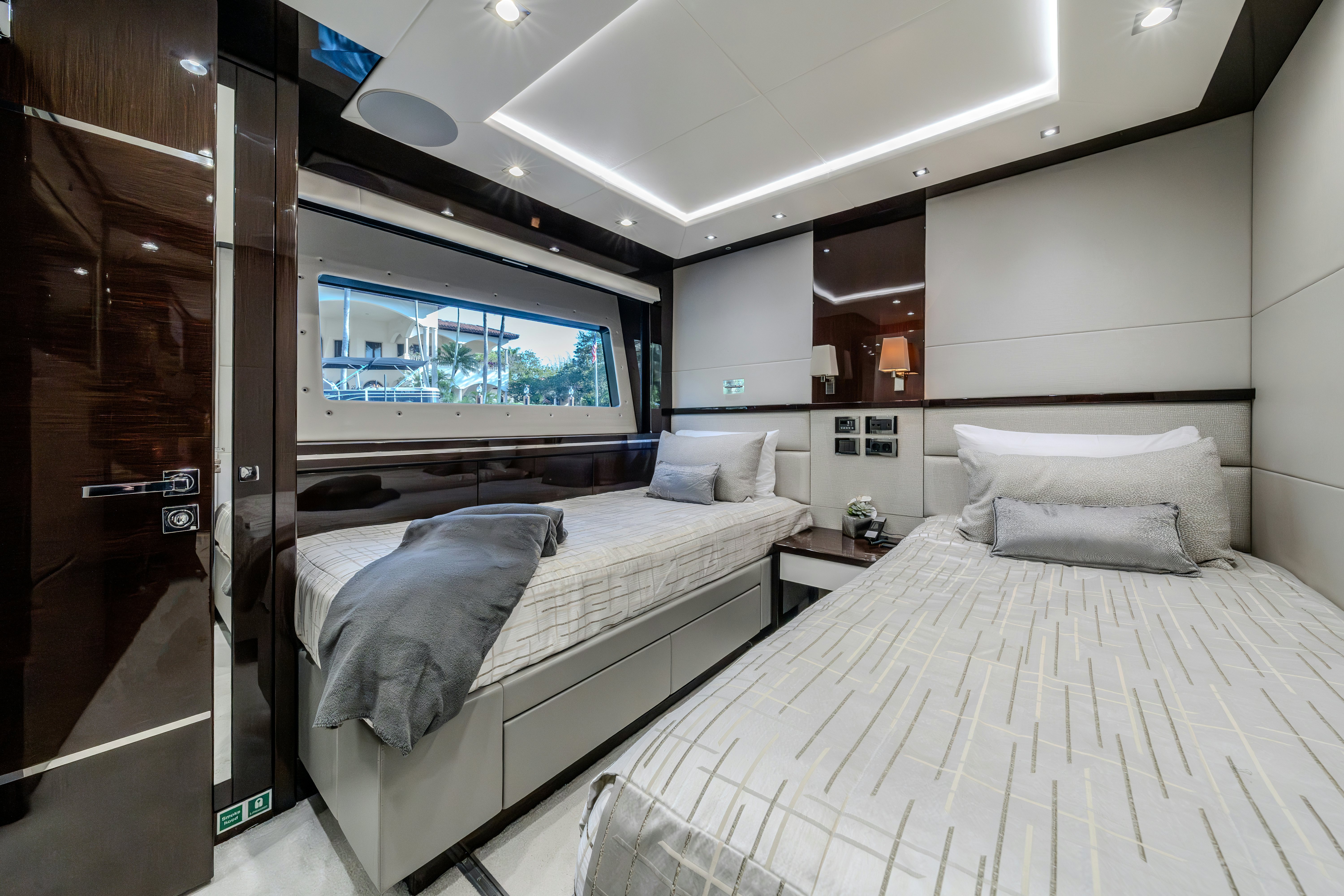 a room with two beds aboard LOST BOYS Yacht for Sale