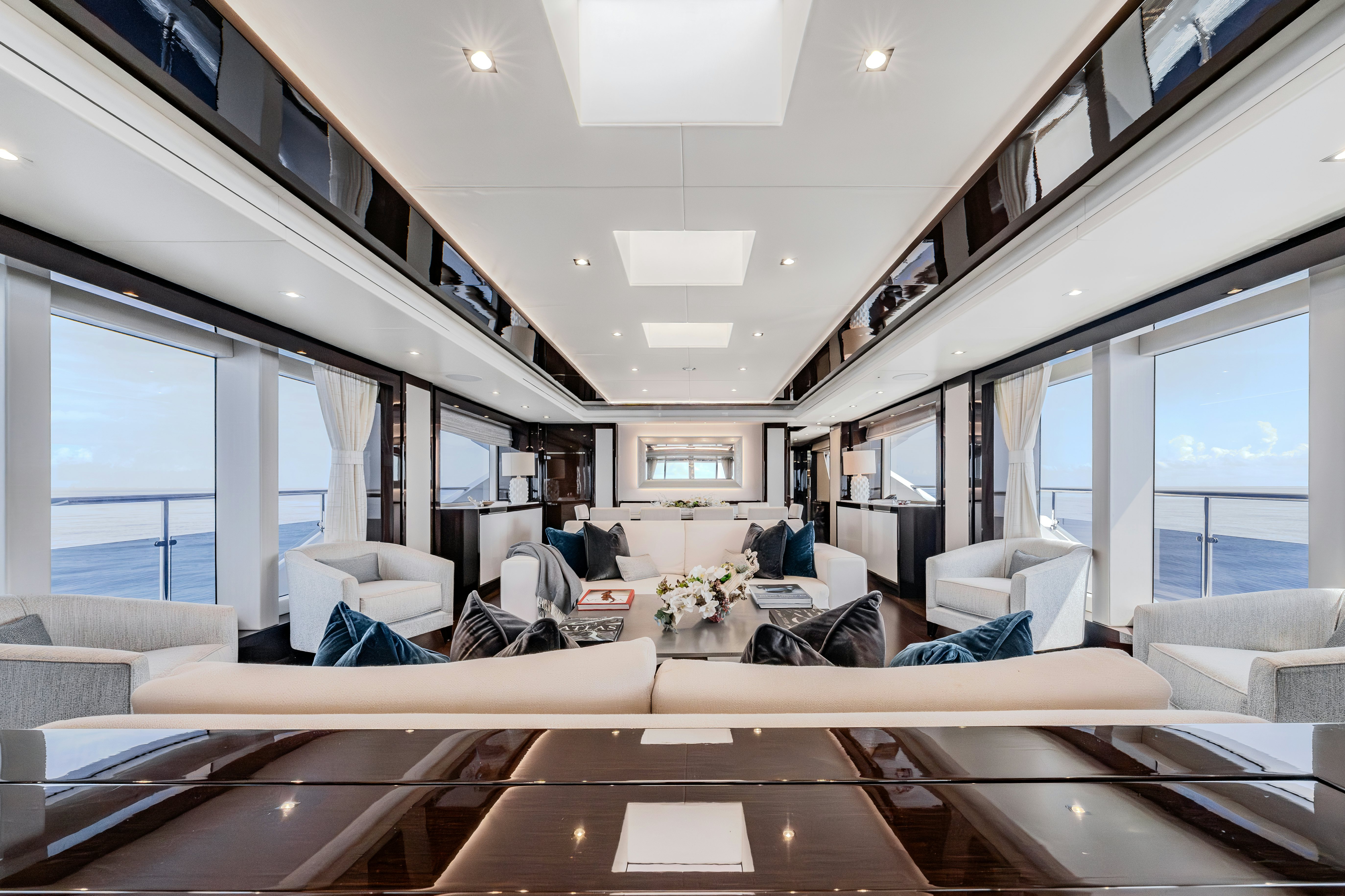 a room with a couch and a window aboard LOST BOYS Yacht for Sale