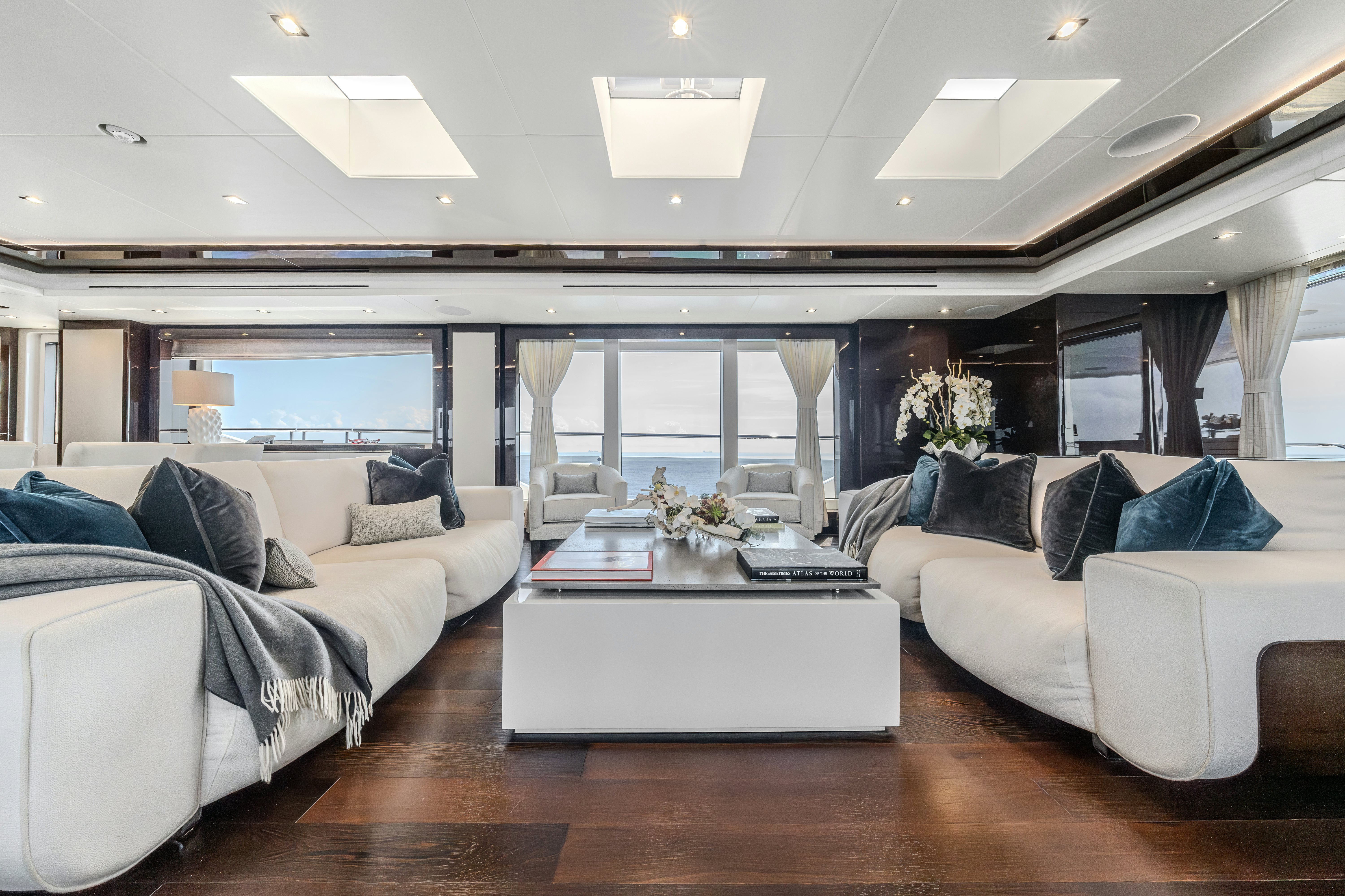 a living room with a large window aboard LOST BOYS Yacht for Sale