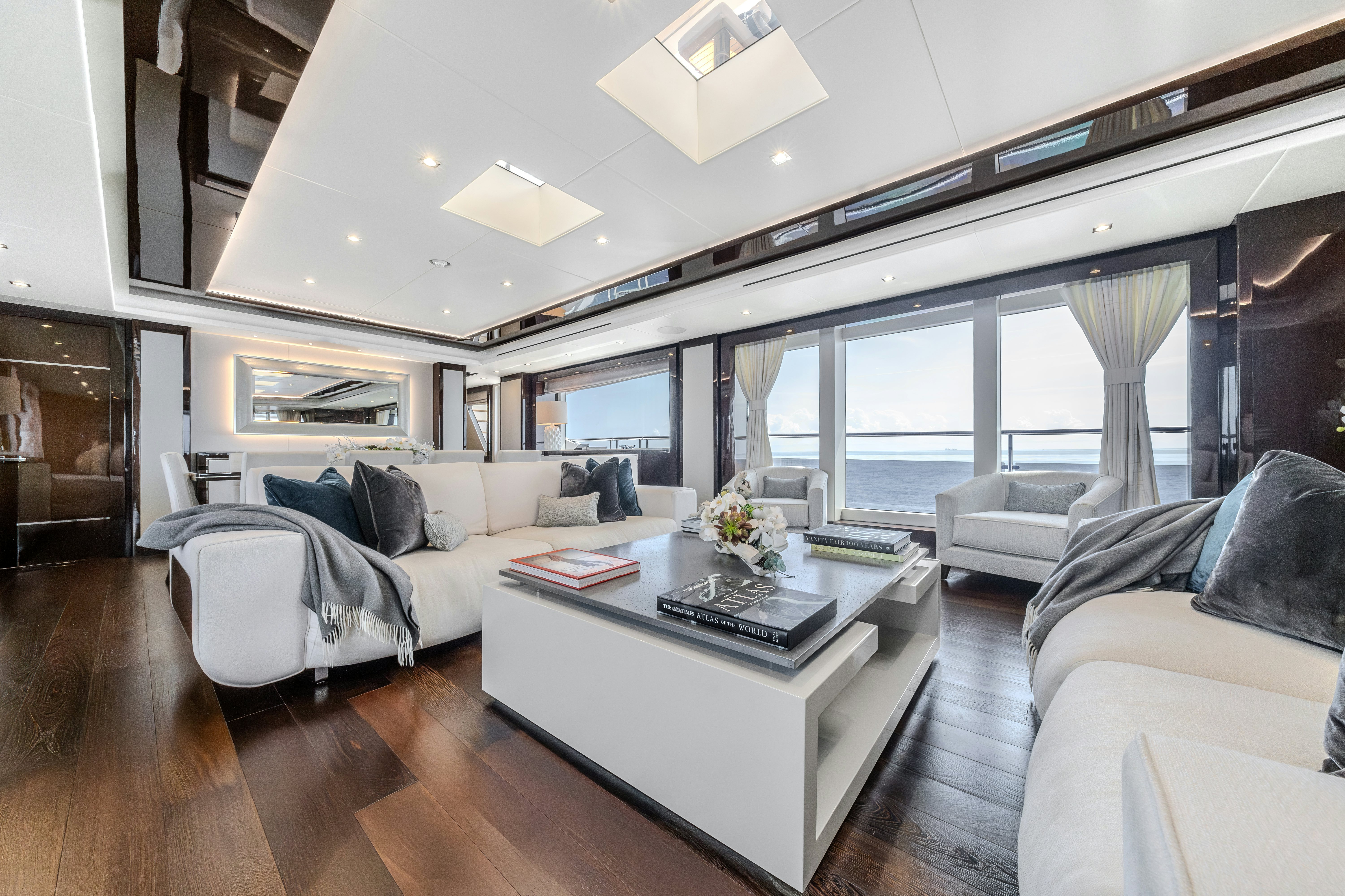 a living room with a large window aboard LOST BOYS Yacht for Sale