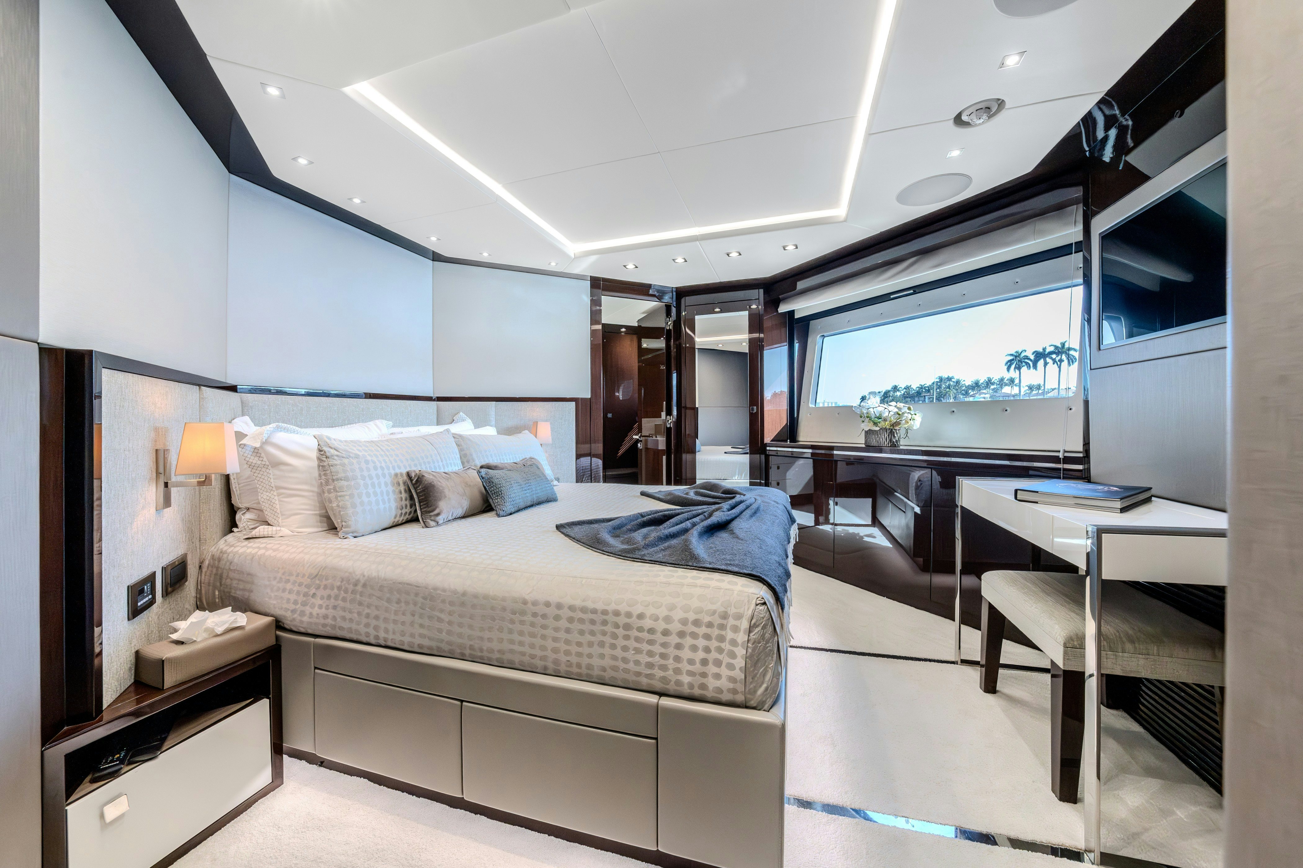 a bedroom with a large bed aboard LOST BOYS Yacht for Sale