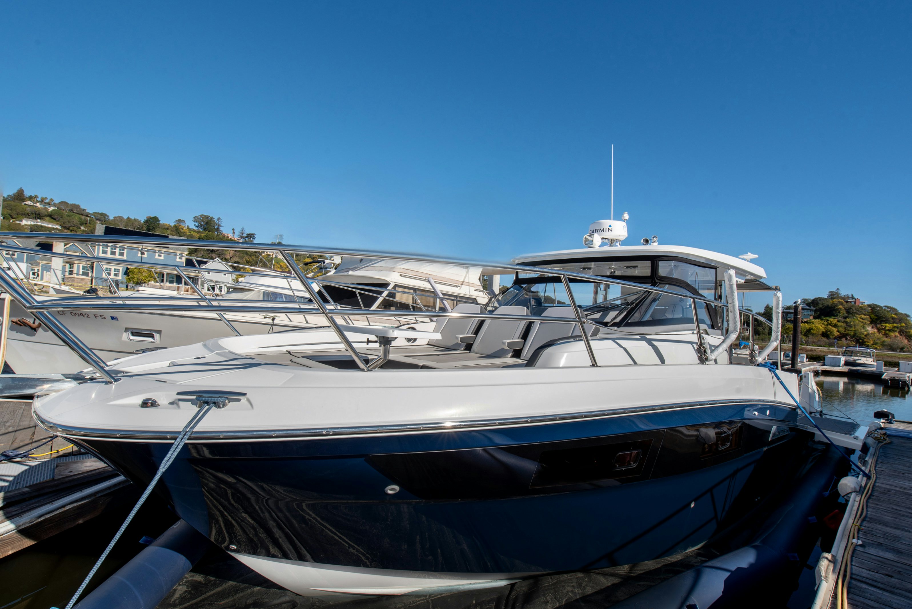 a group of boats are parked in a harbor aboard NAUTI BRIGI GULL Yacht for Sale