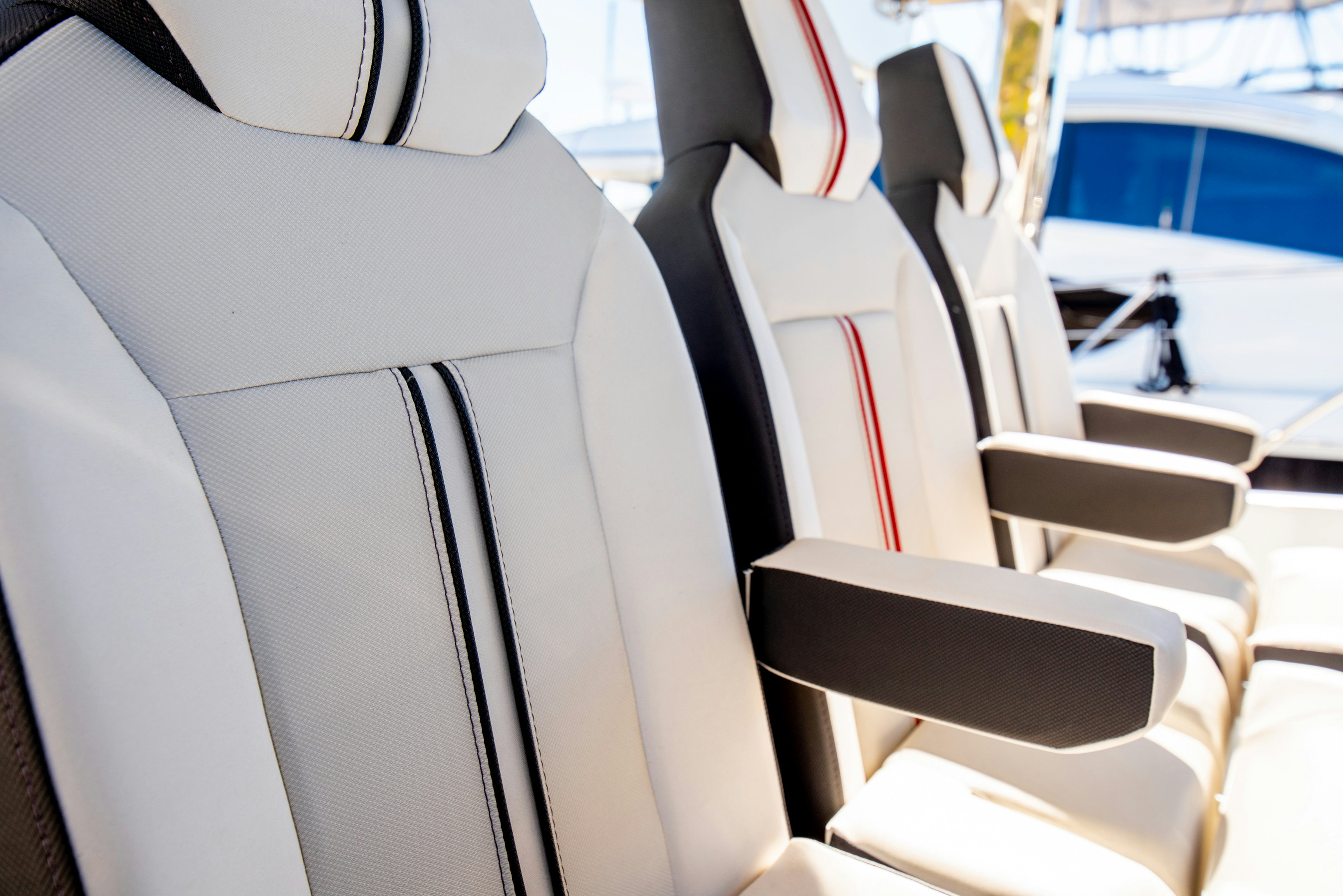 a close-up of a white chair aboard NAUTI BRIGI GULL Yacht for Sale