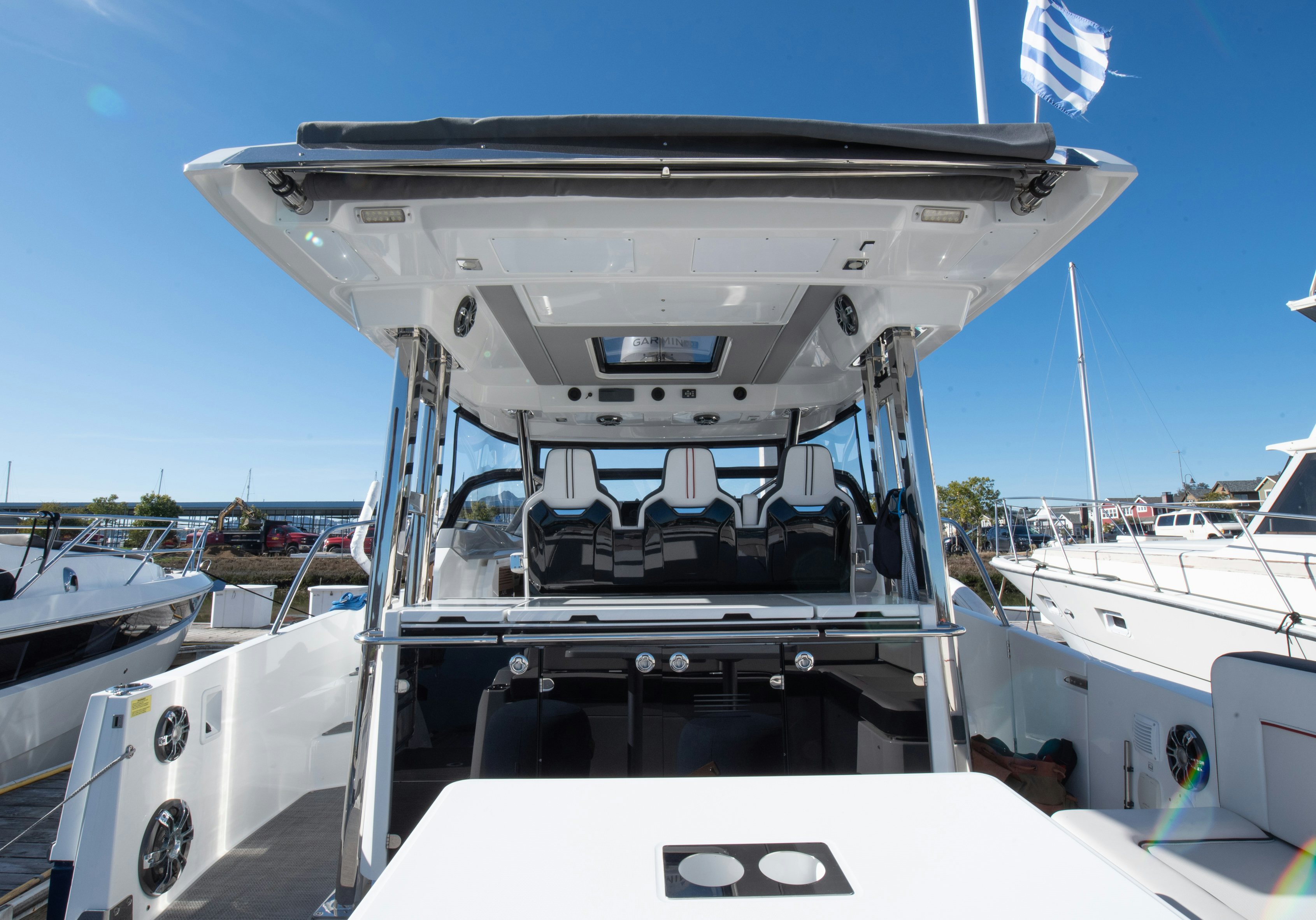 a boat with a deck and a deck with a flag on it aboard NAUTI BRIGI GULL Yacht for Sale