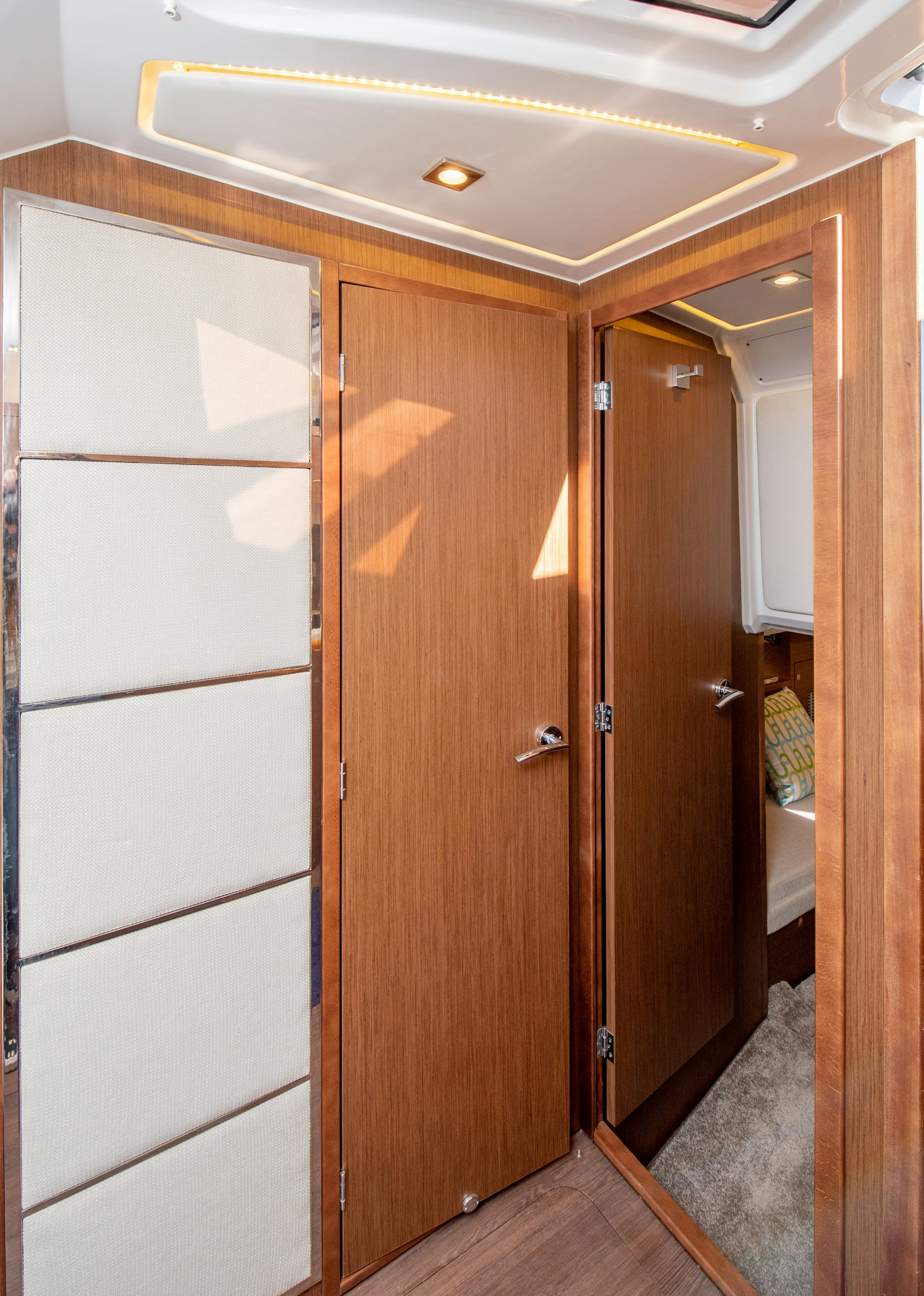 a closet with a door aboard NAUTI BRIGI GULL Yacht for Sale