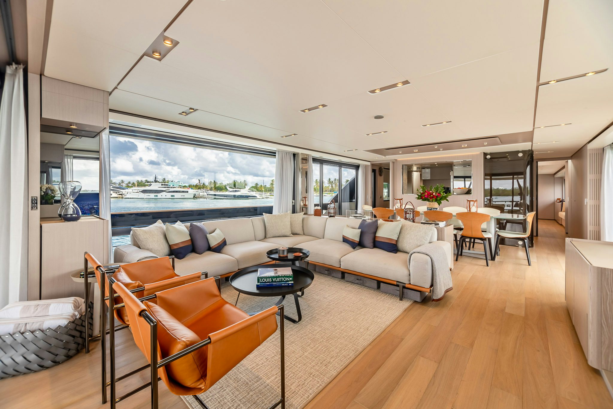 a living room with a large window aboard AURORA Yacht for Sale