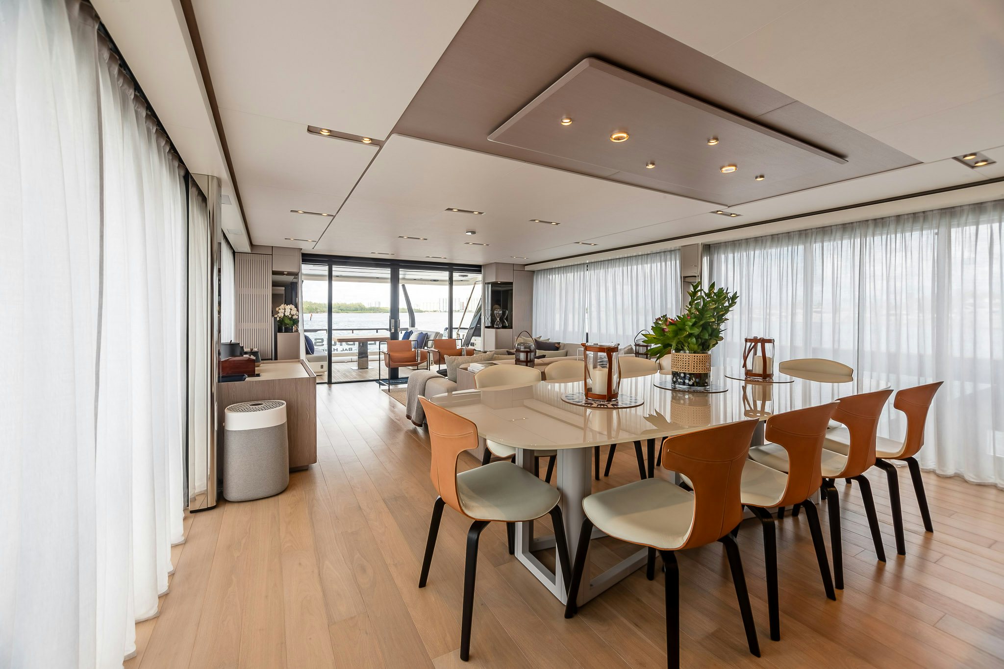 a large dining room with a large table and chairs aboard AURORA Yacht for Sale
