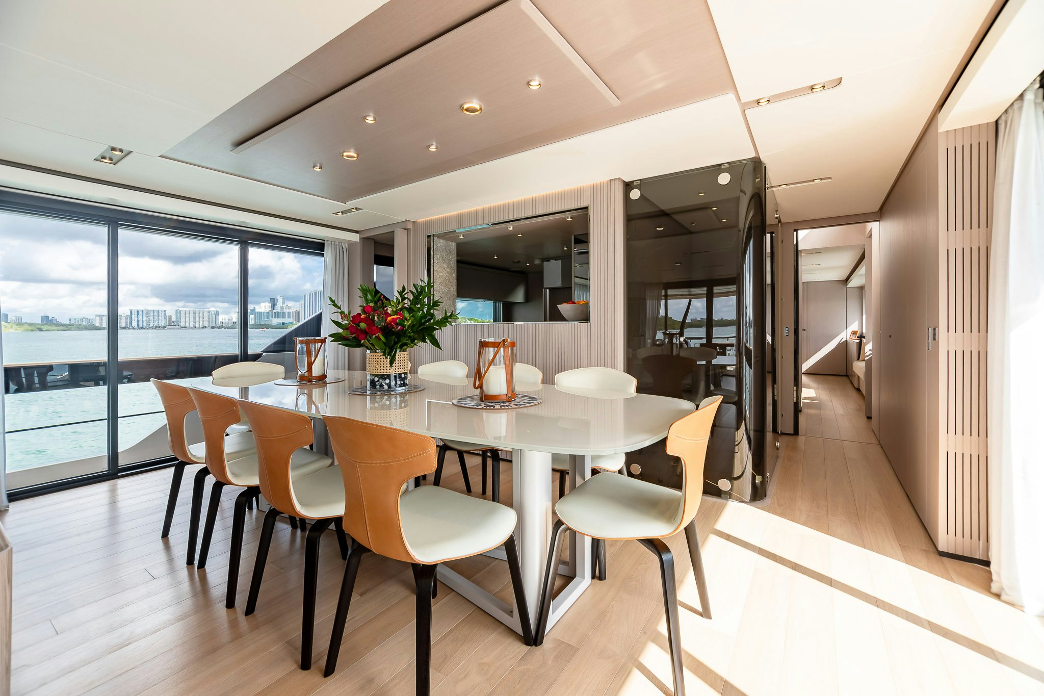 a large dining table with chairs aboard AURORA Yacht for Sale