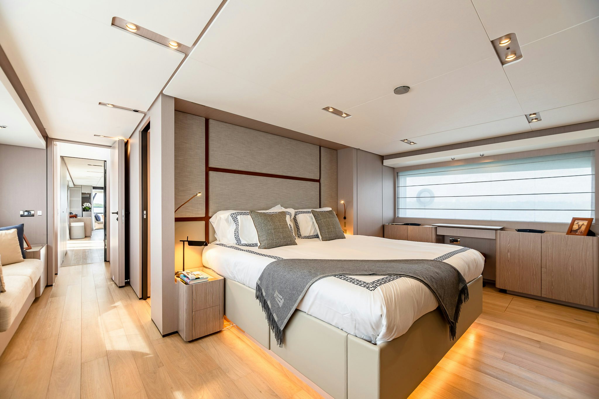 a bedroom with a large bed aboard AURORA Yacht for Sale