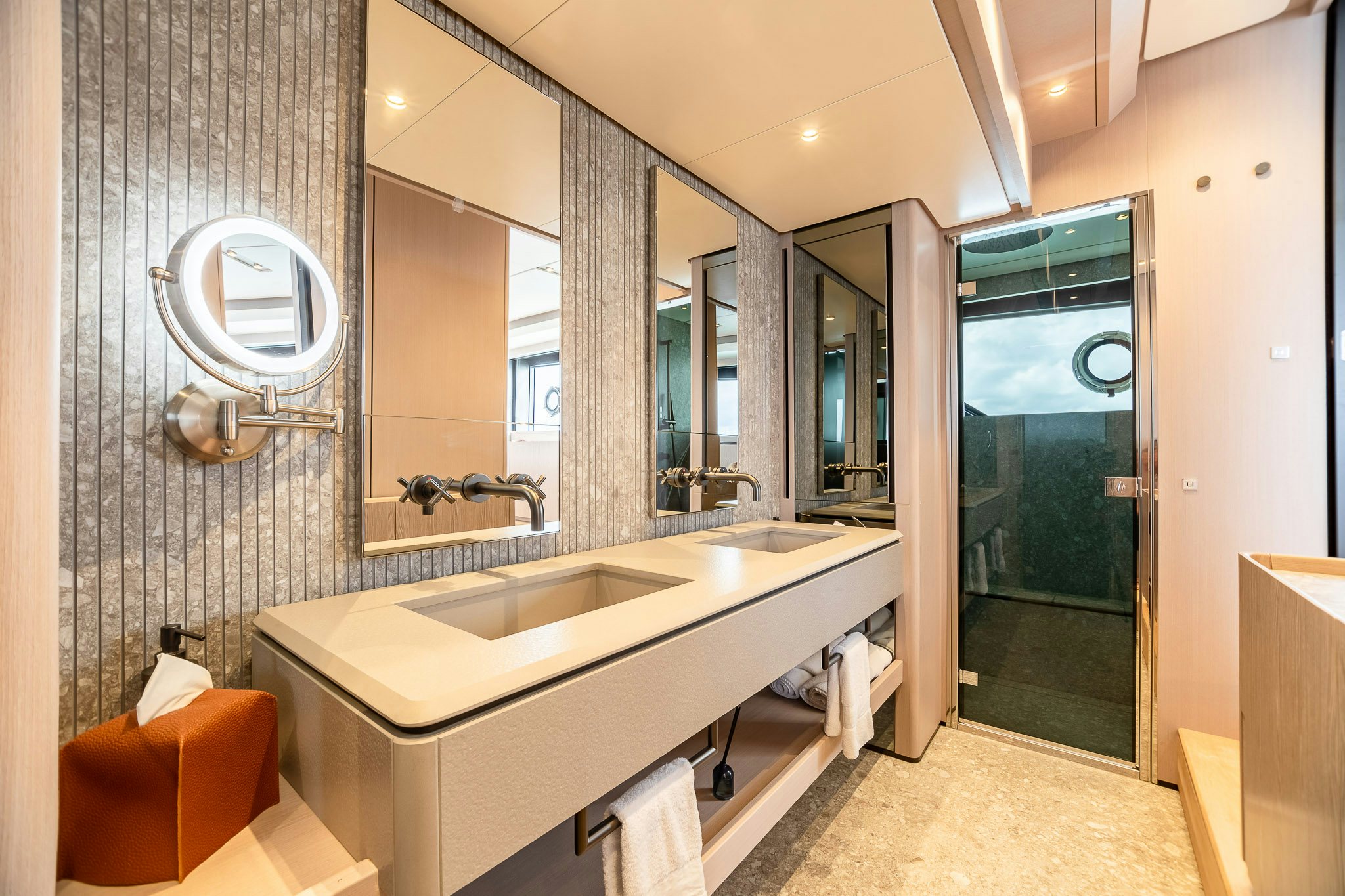 a bathroom with a sink and a mirror aboard AURORA Yacht for Sale