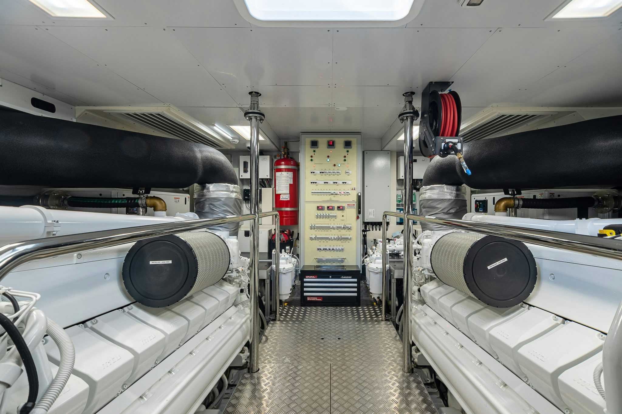 a room with large machines aboard AURORA Yacht for Sale