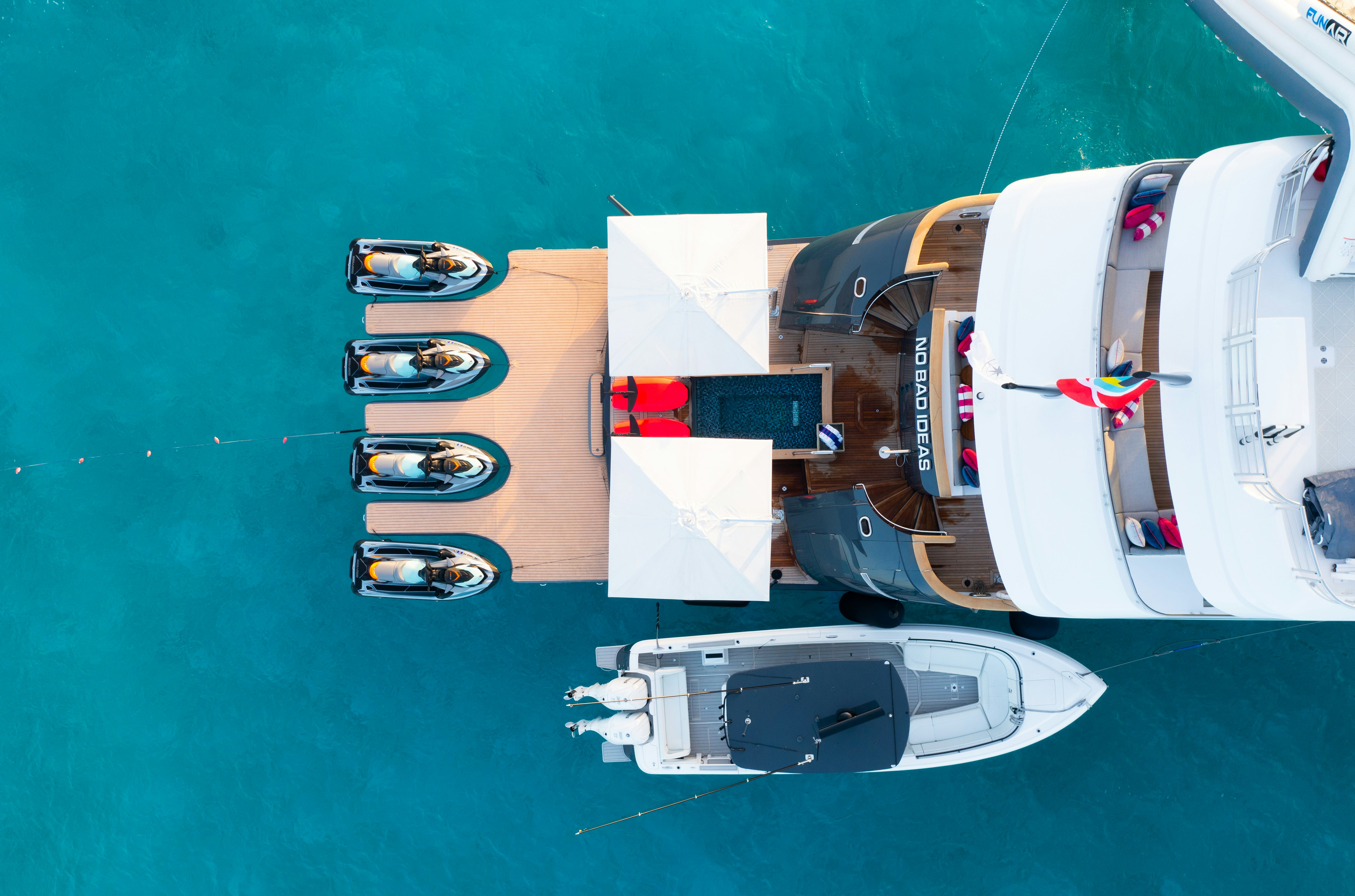 a group of black and white satellite dishes on a green table aboard NO BAD IDEAS Yacht for Sale