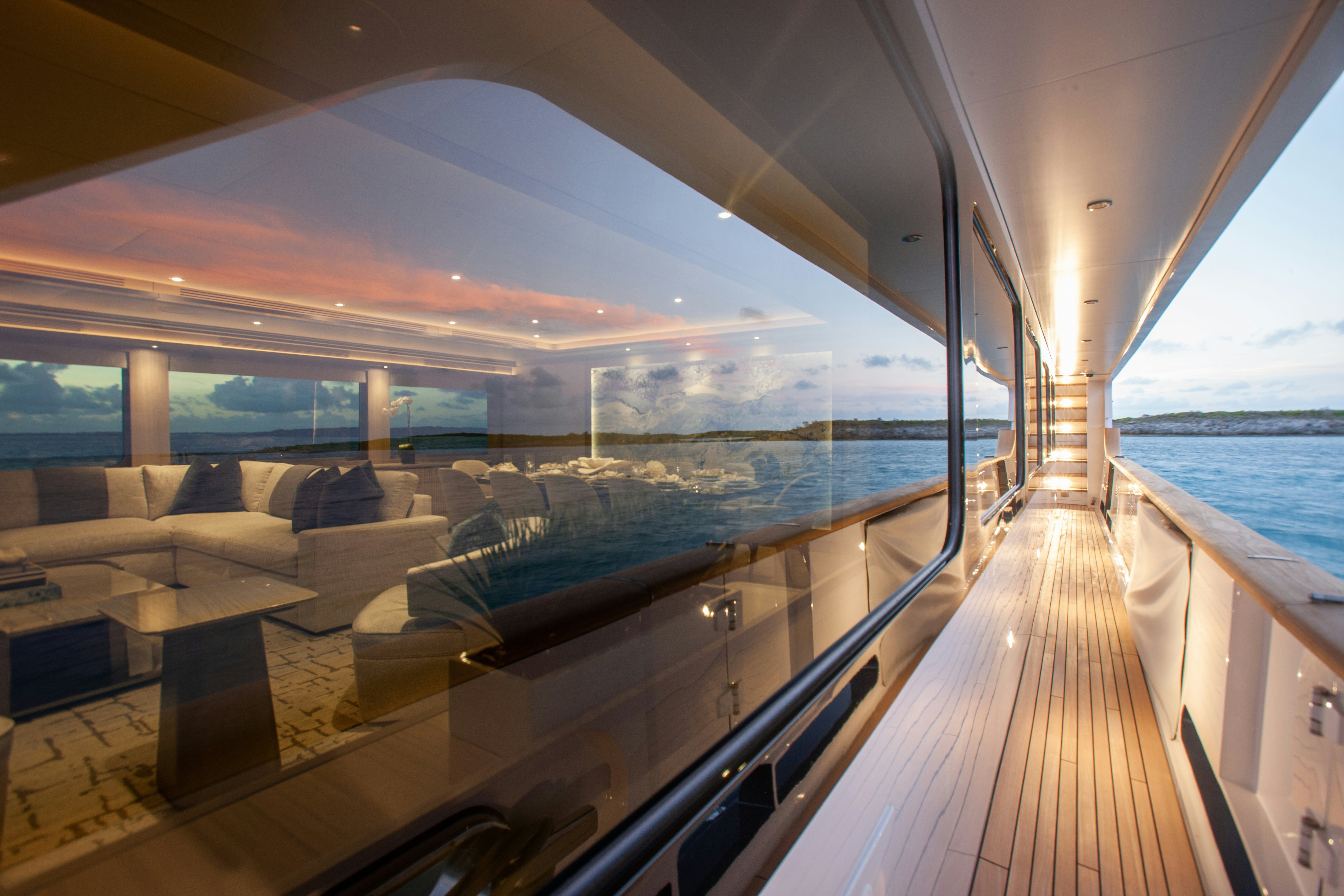 a deck with a view of the ocean and the deck aboard NO BAD IDEAS Yacht for Sale