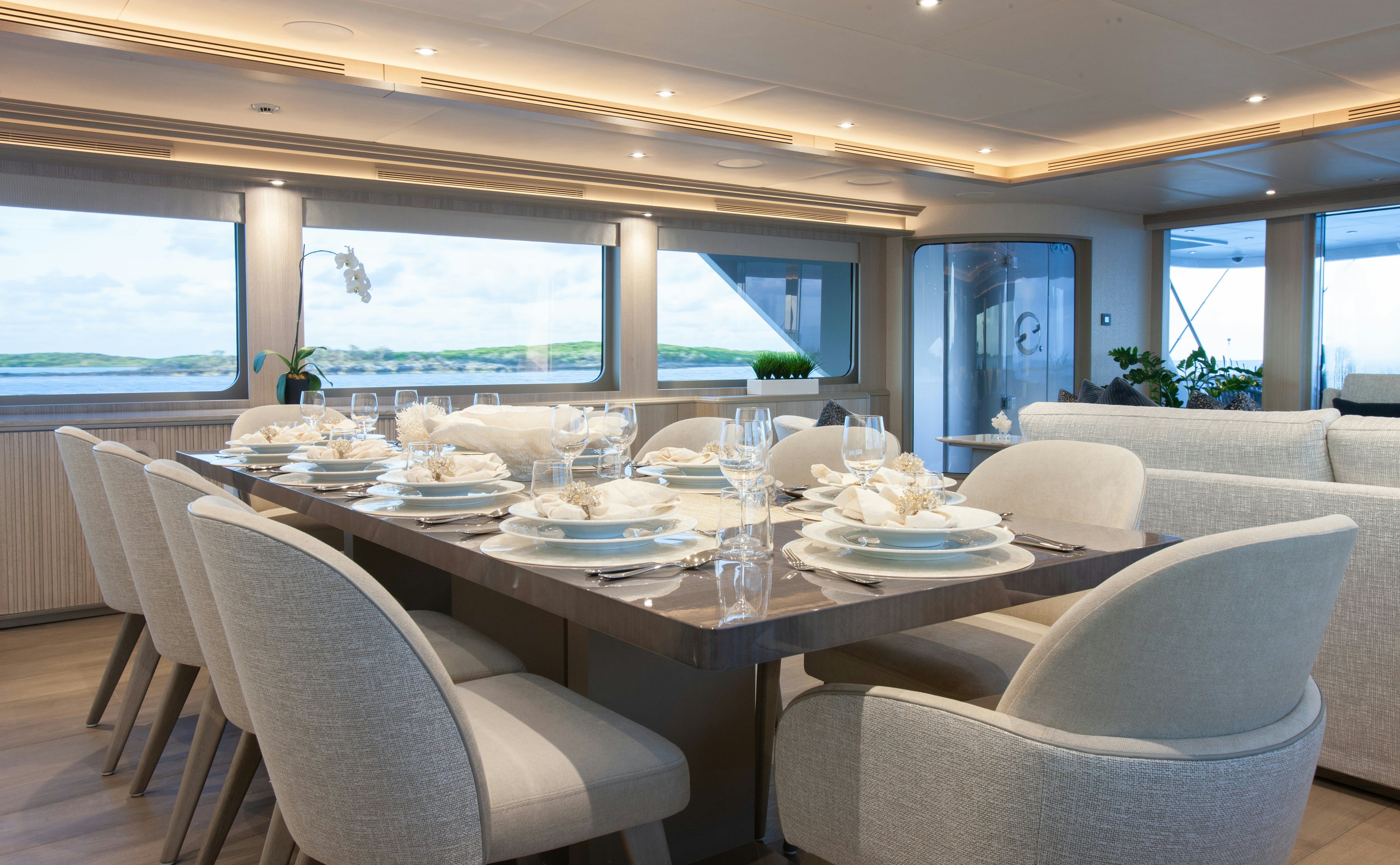a dining table set for a meal aboard NO BAD IDEAS Yacht for Sale