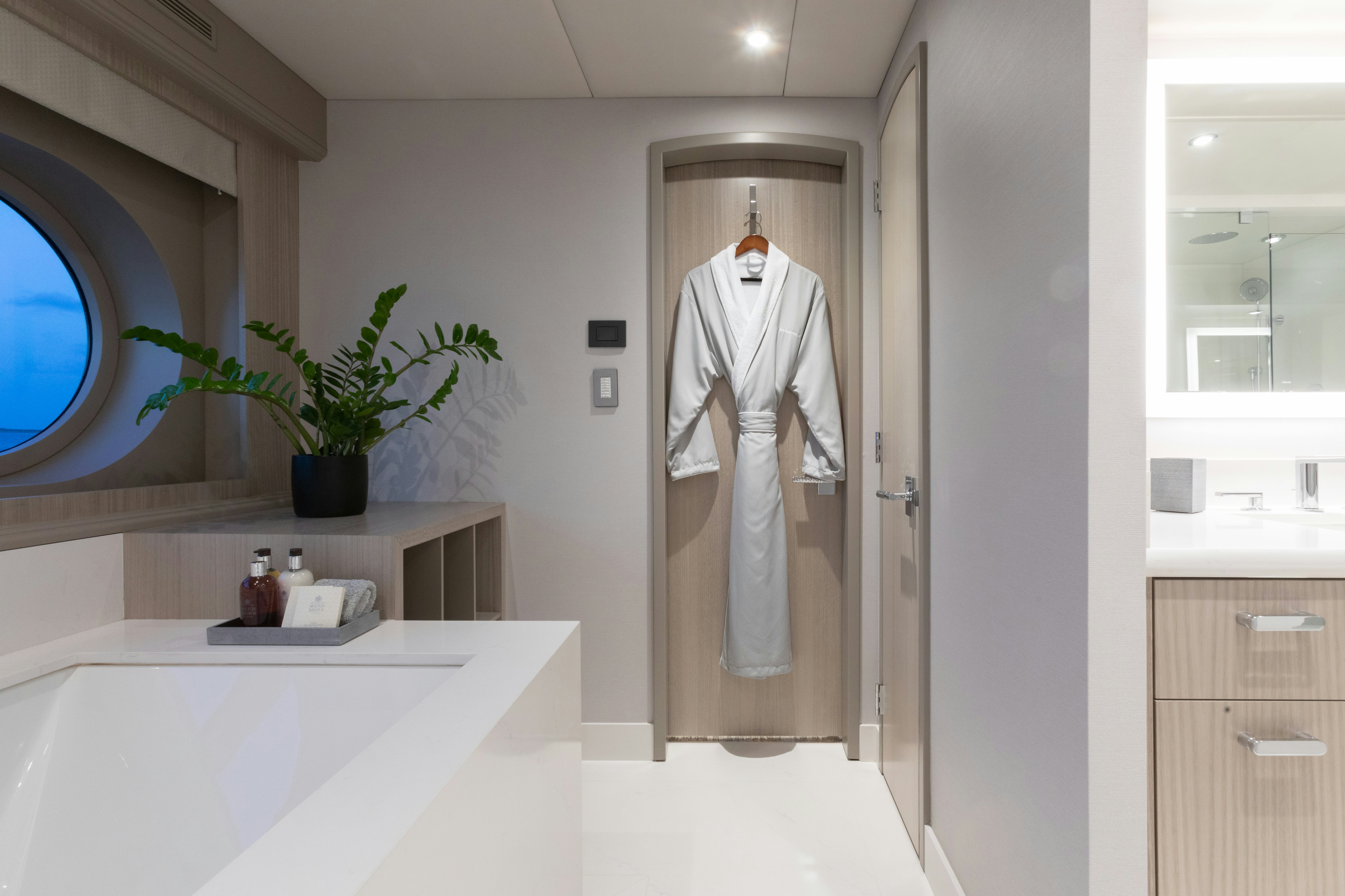 a robed person in a room aboard NO BAD IDEAS Yacht for Sale