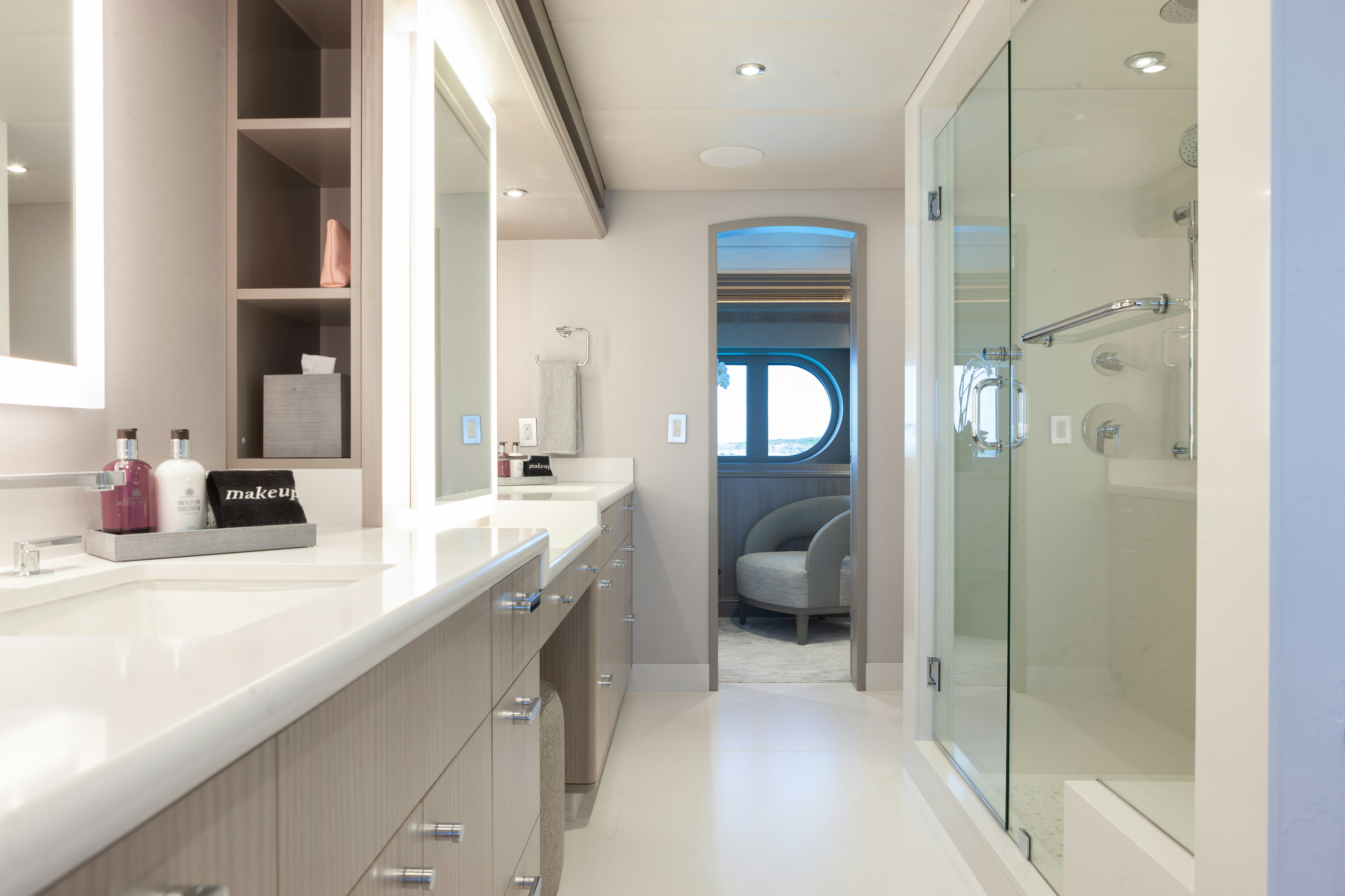 a bathroom with a sink and a shower unit aboard NO BAD IDEAS Yacht for Sale