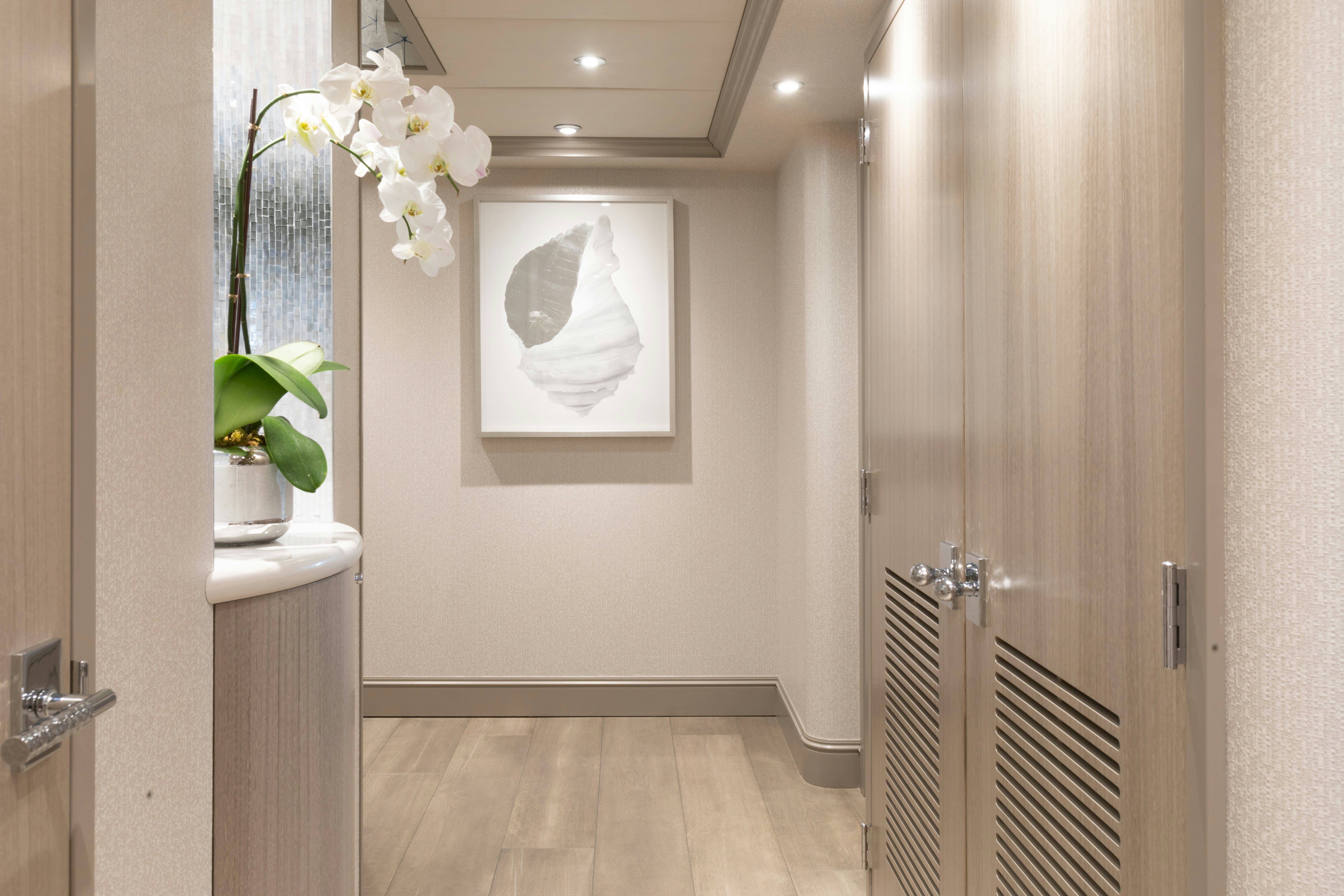 a white door with a mirror above it aboard NO BAD IDEAS Yacht for Sale