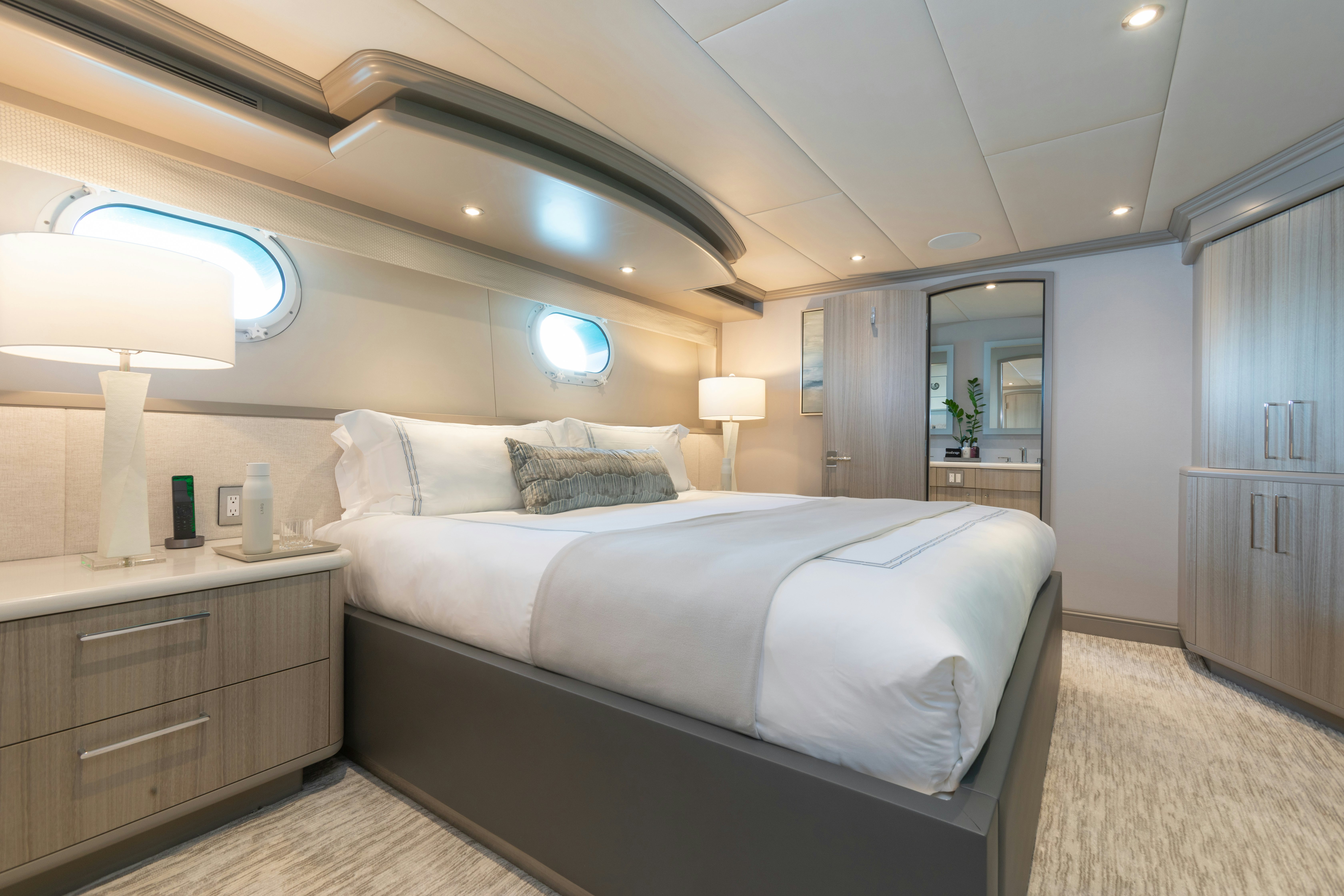 a large bedroom with a large bed aboard NO BAD IDEAS Yacht for Sale