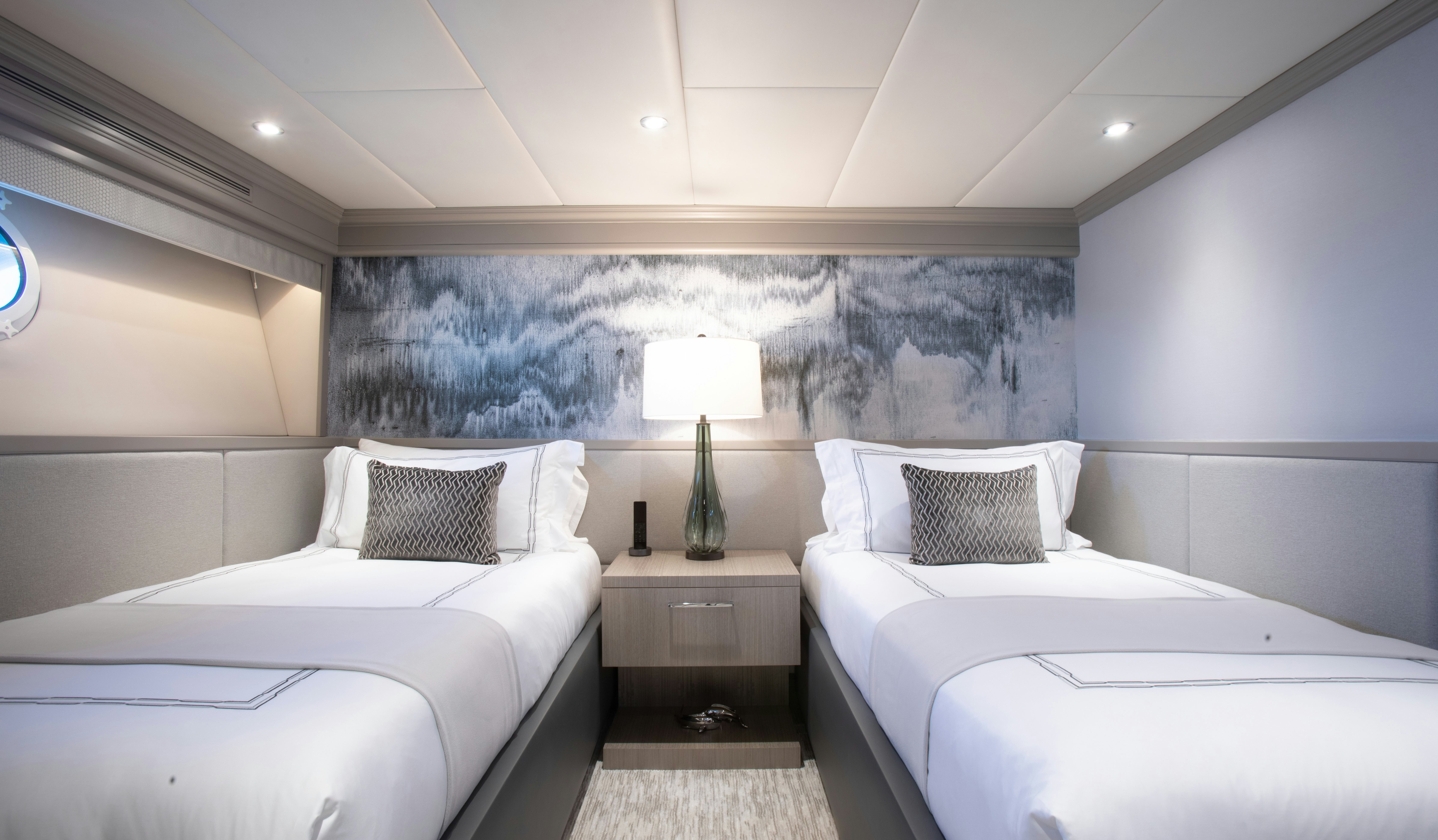 a couple of beds in a room aboard NO BAD IDEAS Yacht for Sale