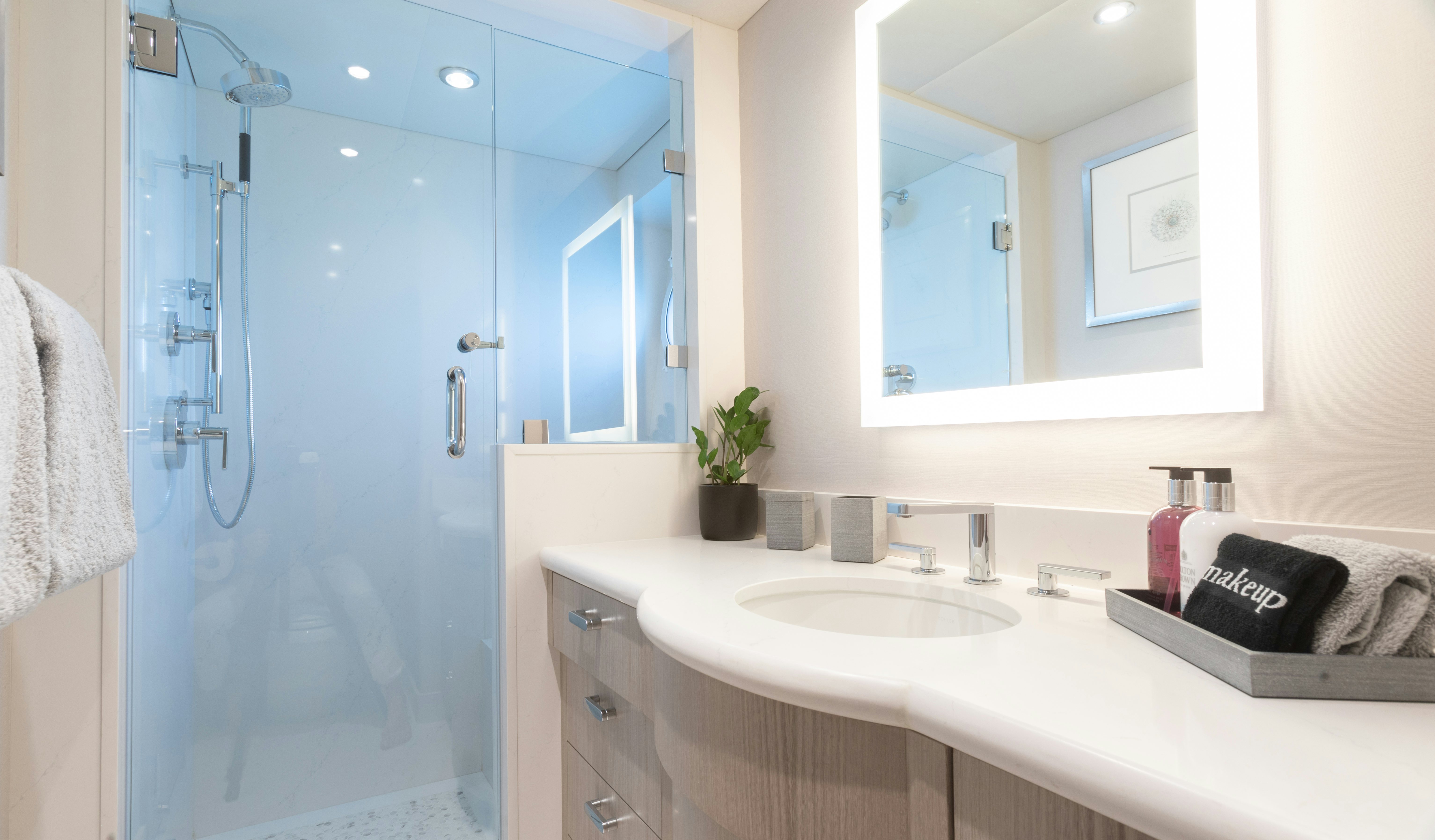 a bathroom with a shower and sink aboard NO BAD IDEAS Yacht for Sale