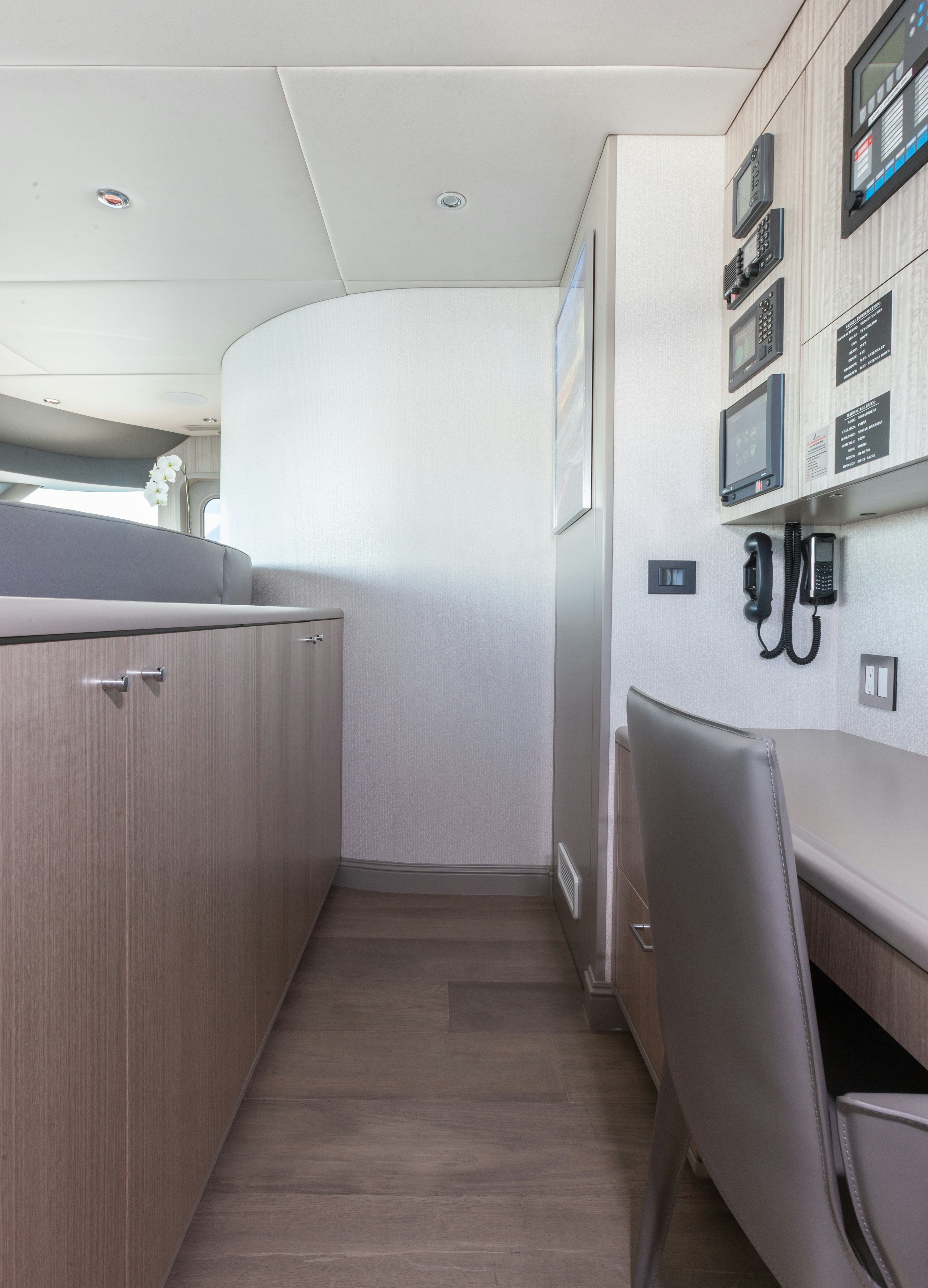 a hallway with a door and a window aboard NO BAD IDEAS Yacht for Sale