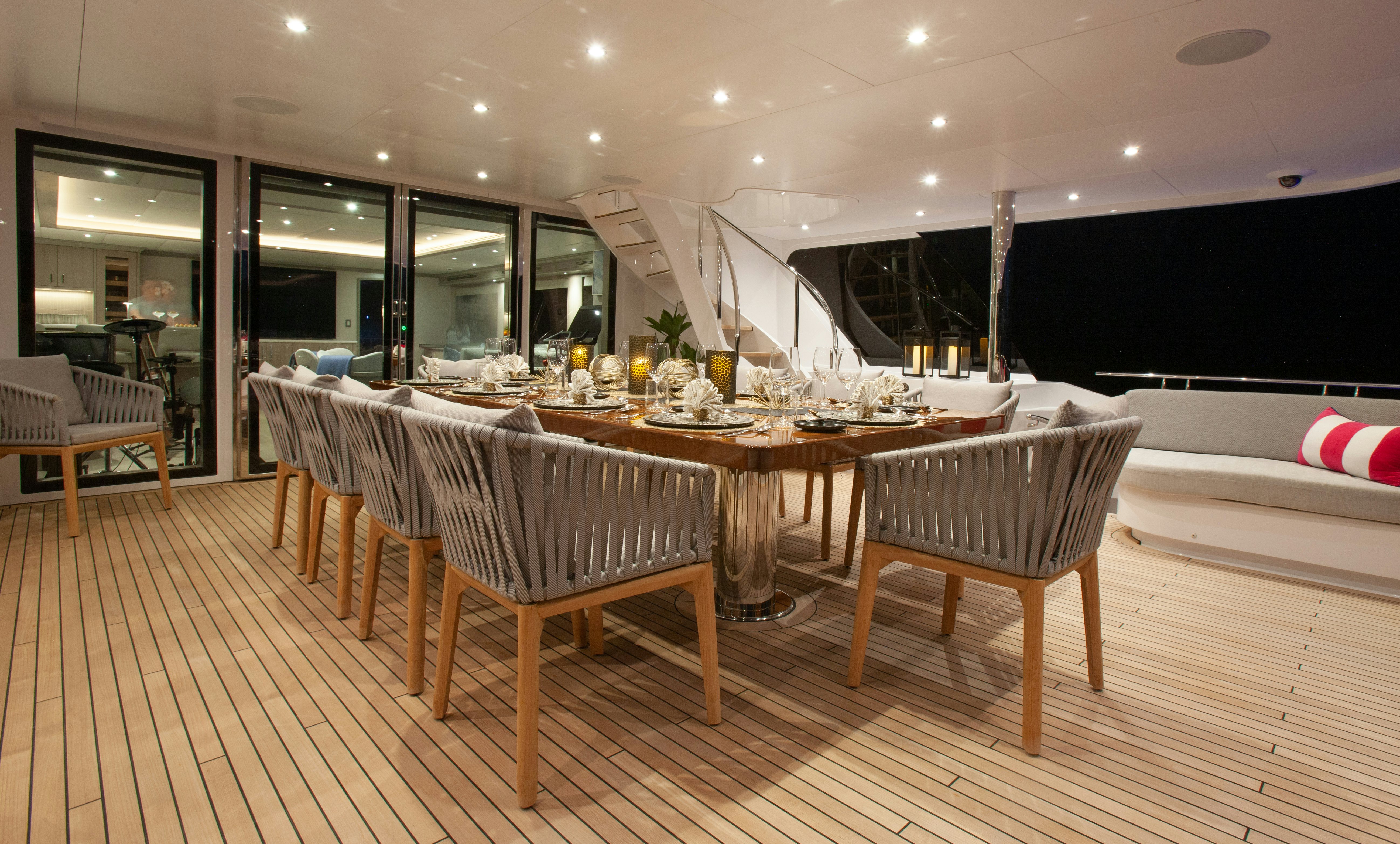 a large dining room table aboard NO BAD IDEAS Yacht for Sale