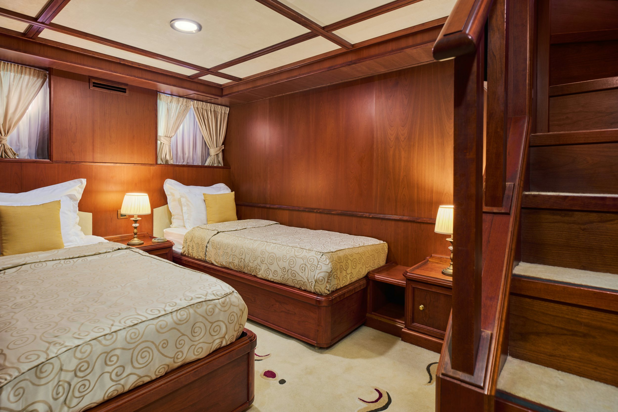 a couple of beds in a hotel room aboard SEAGULL II Yacht for Charter