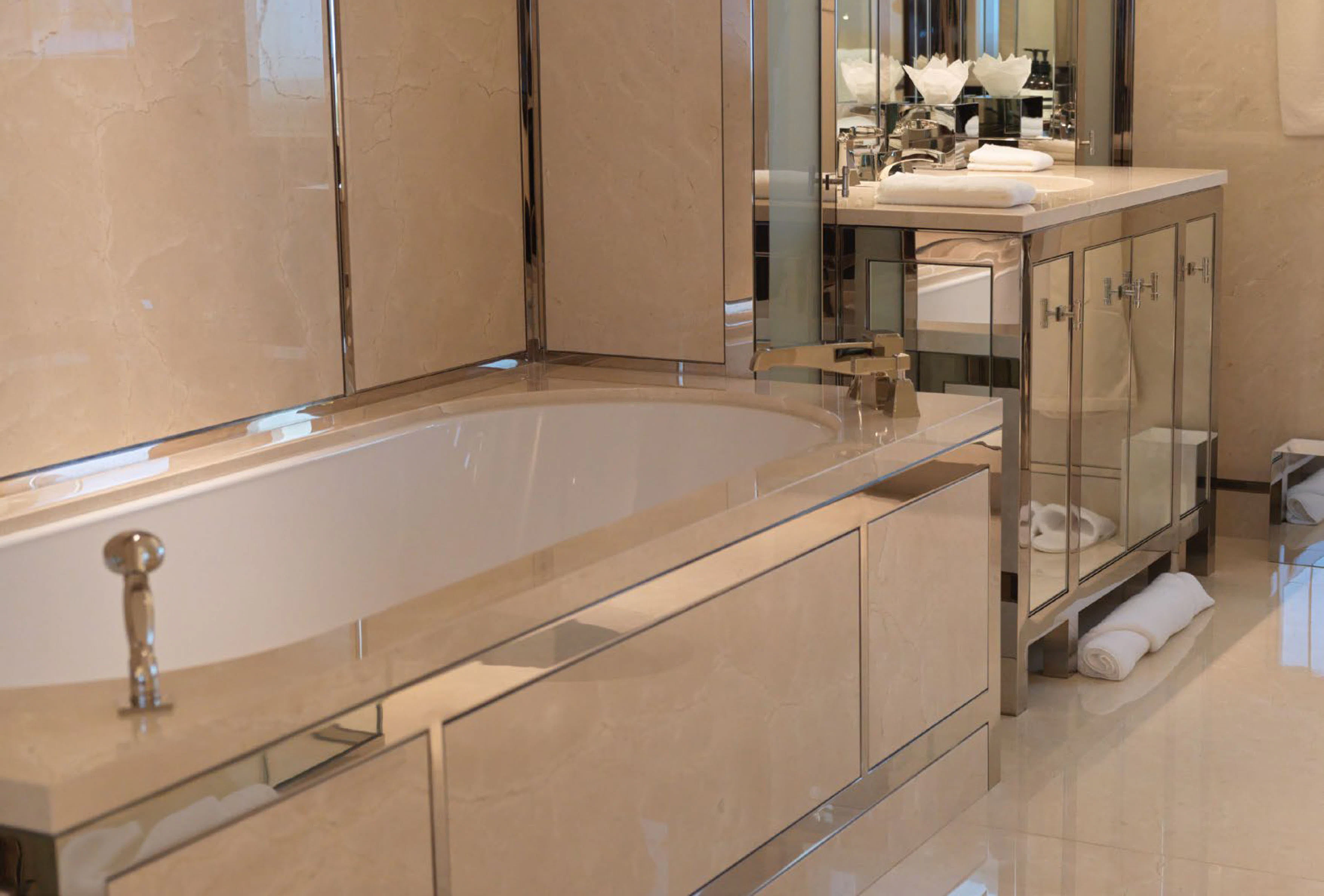 a bathroom with a large bathtub aboard SOLACE Yacht for Charter