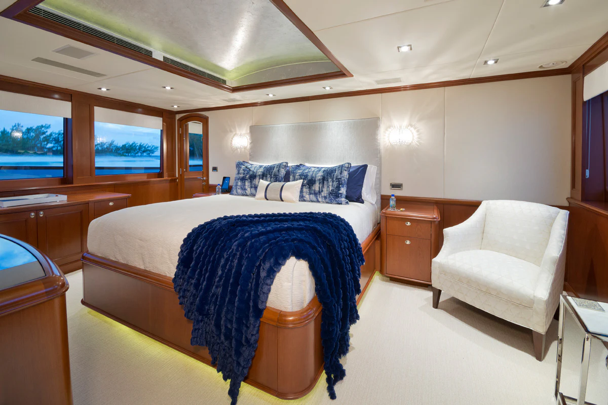 a large bedroom with a large bed aboard FORE ACES Yacht for Sale