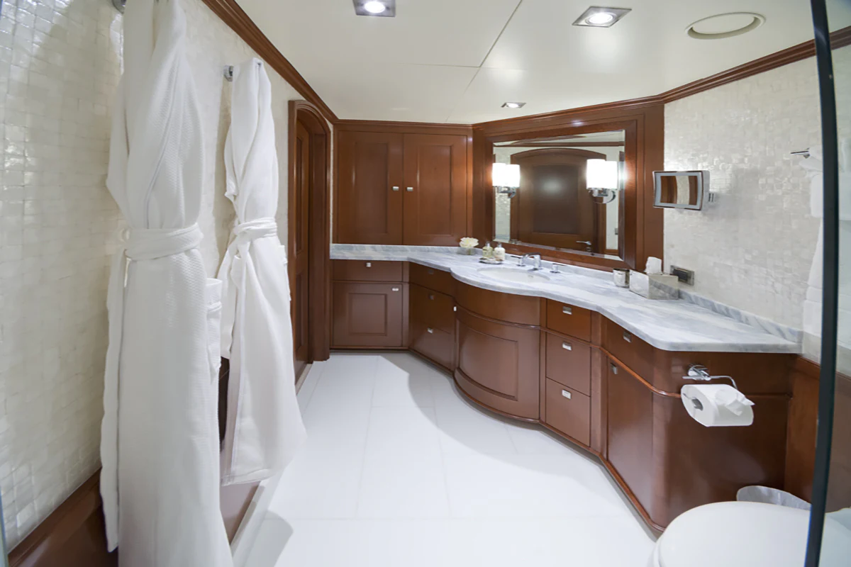 a bathroom with a large mirror aboard FORE ACES Yacht for Sale