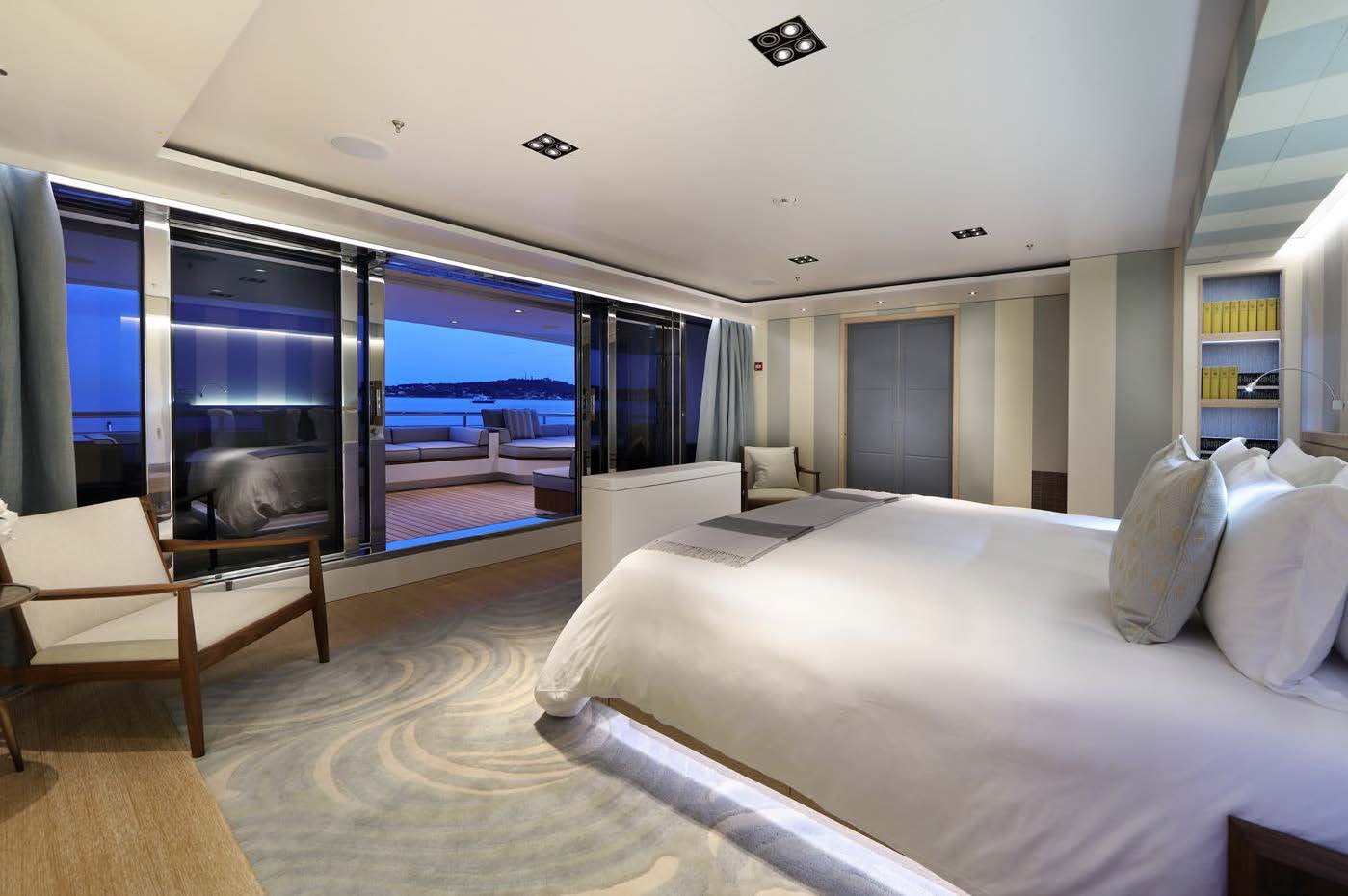 a room with a bed and a tv aboard PLANET NINE Yacht for Sale