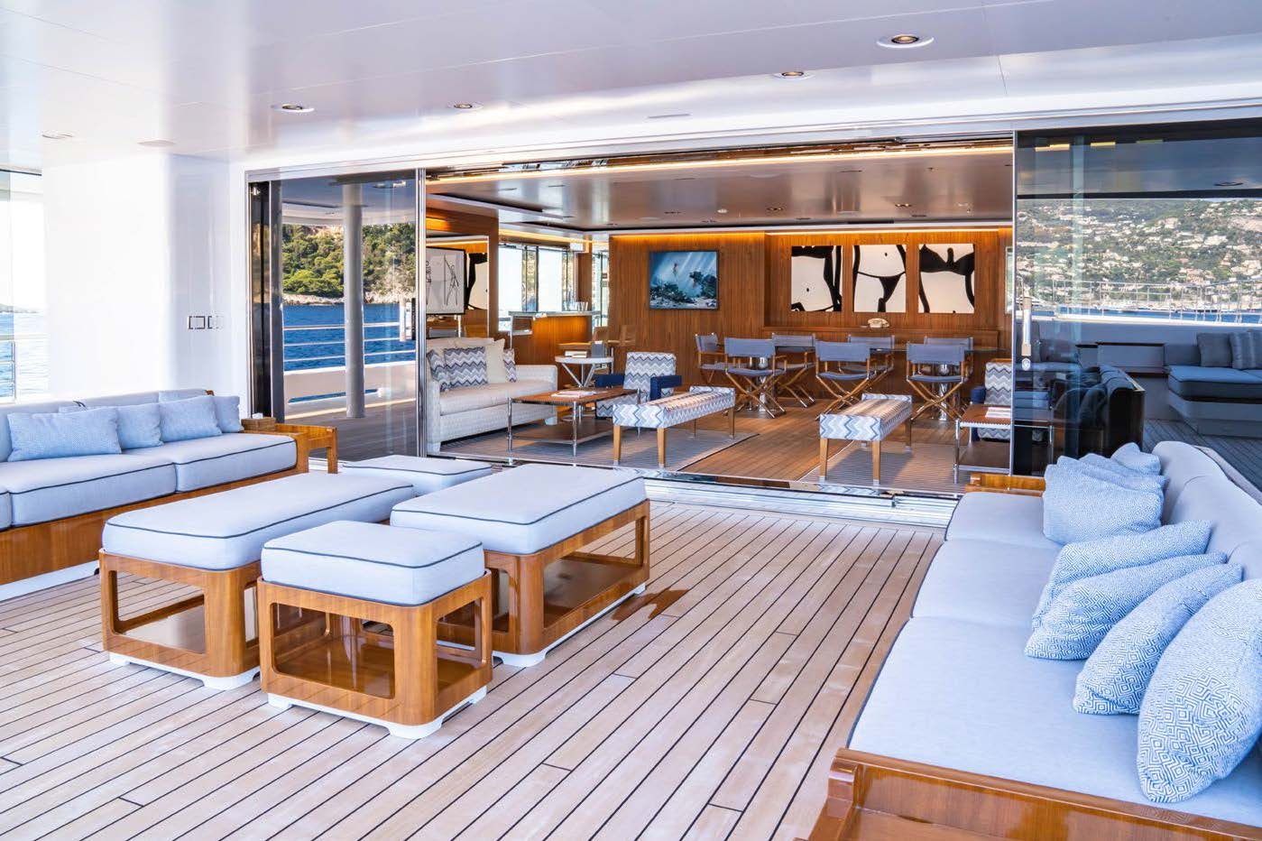 a living room with a wood floor aboard PLANET NINE Yacht for Sale
