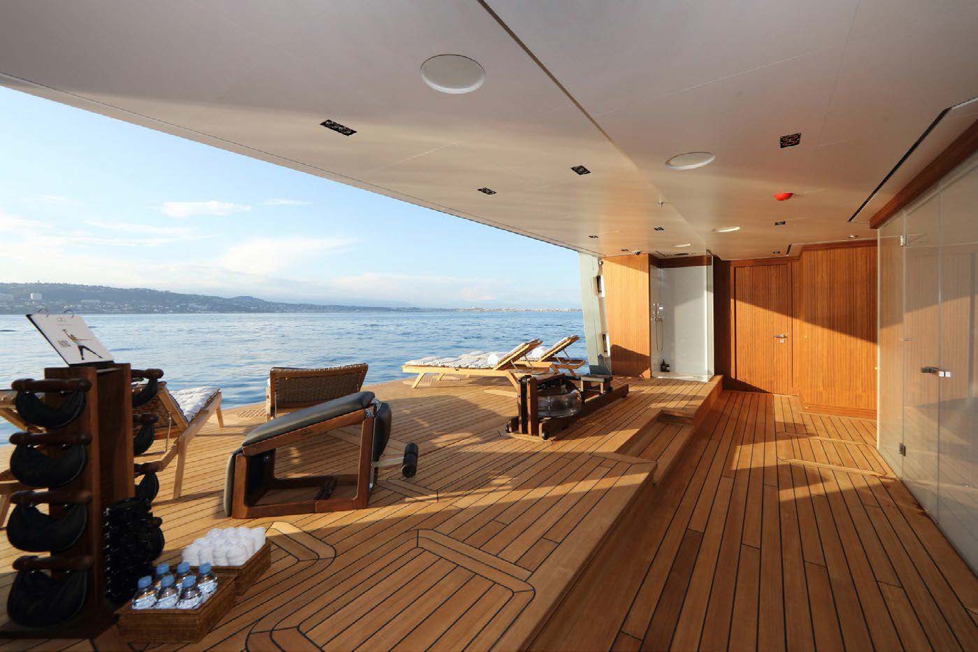 a deck with a view of the ocean and the deck aboard PLANET NINE Yacht for Sale