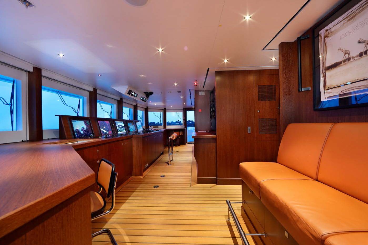 a room with a wood floor and a wood door aboard PLANET NINE Yacht for Sale