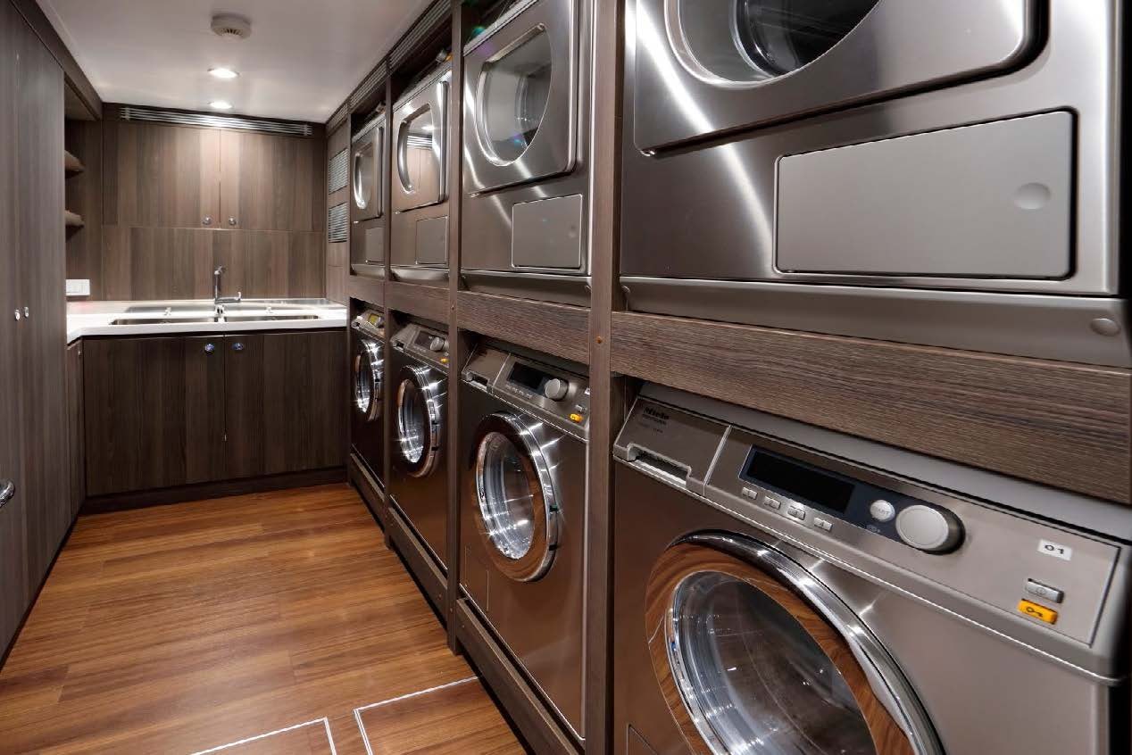 a kitchen with stainless steel appliances aboard PLANET NINE Yacht for Sale