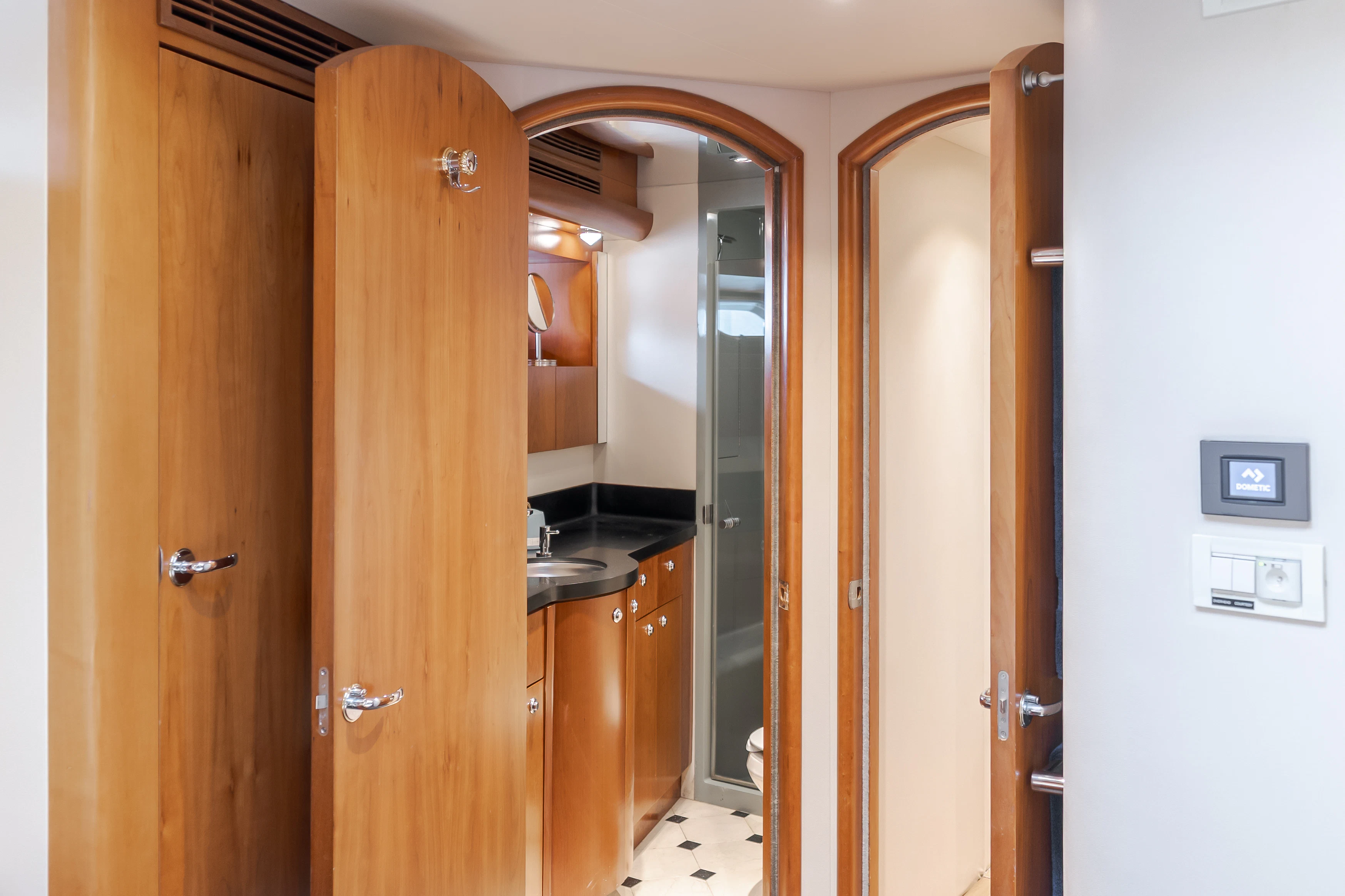 a bathroom with a couple of stalls aboard EASY Yacht for Sale