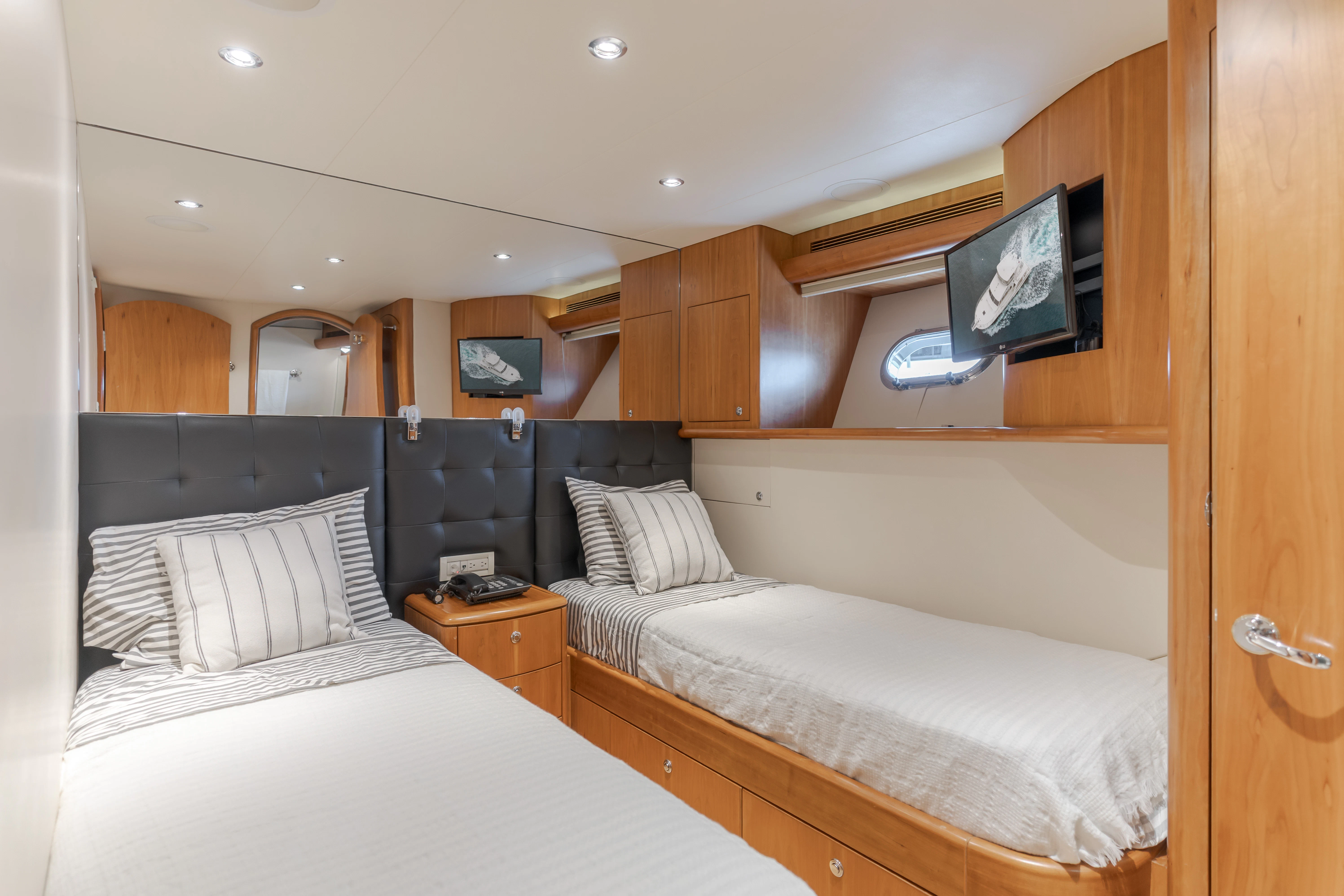 a couple of beds in a room aboard EASY Yacht for Sale