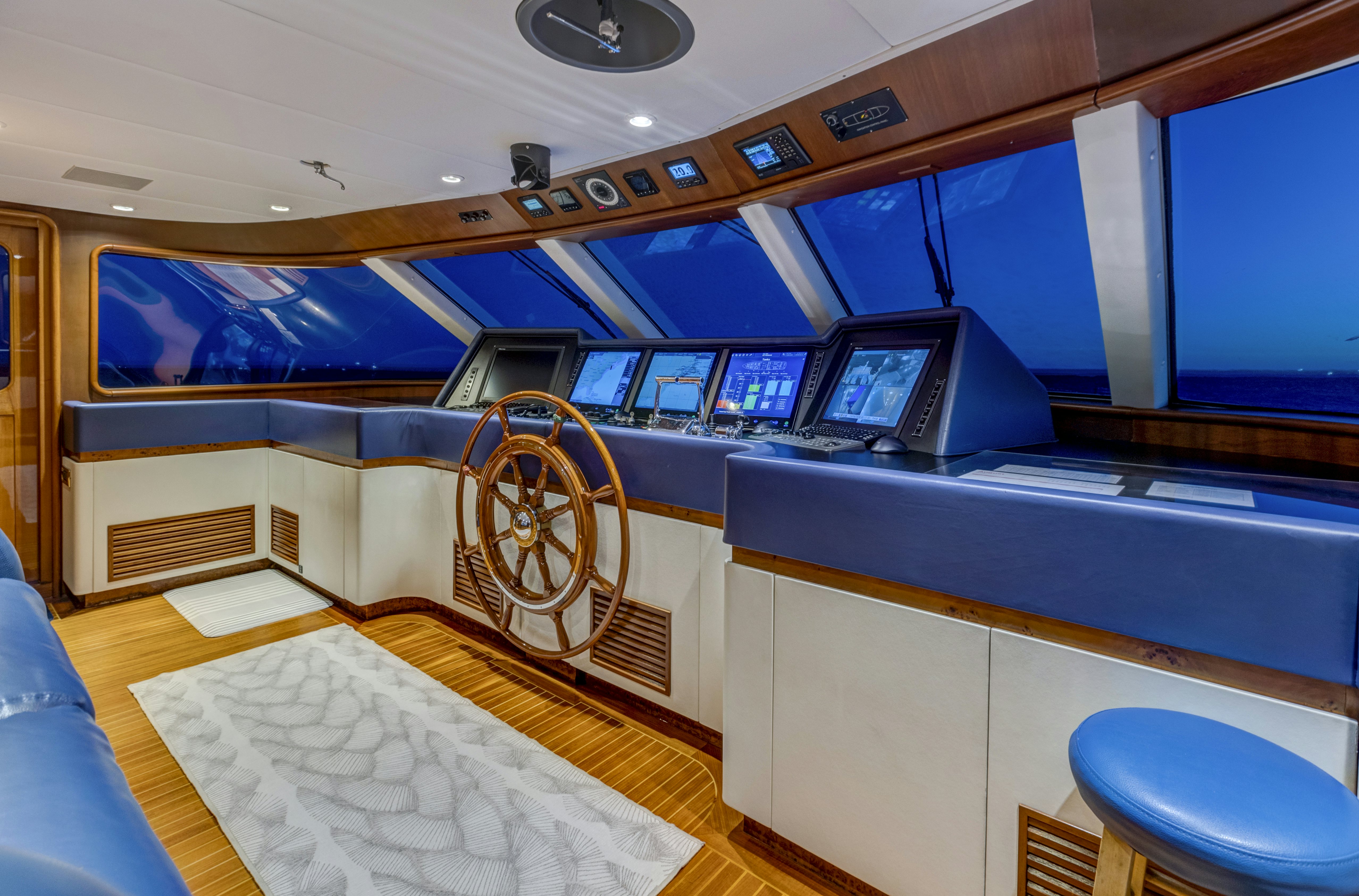 a room with a large screen aboard TRUE NORTH Yacht for Sale