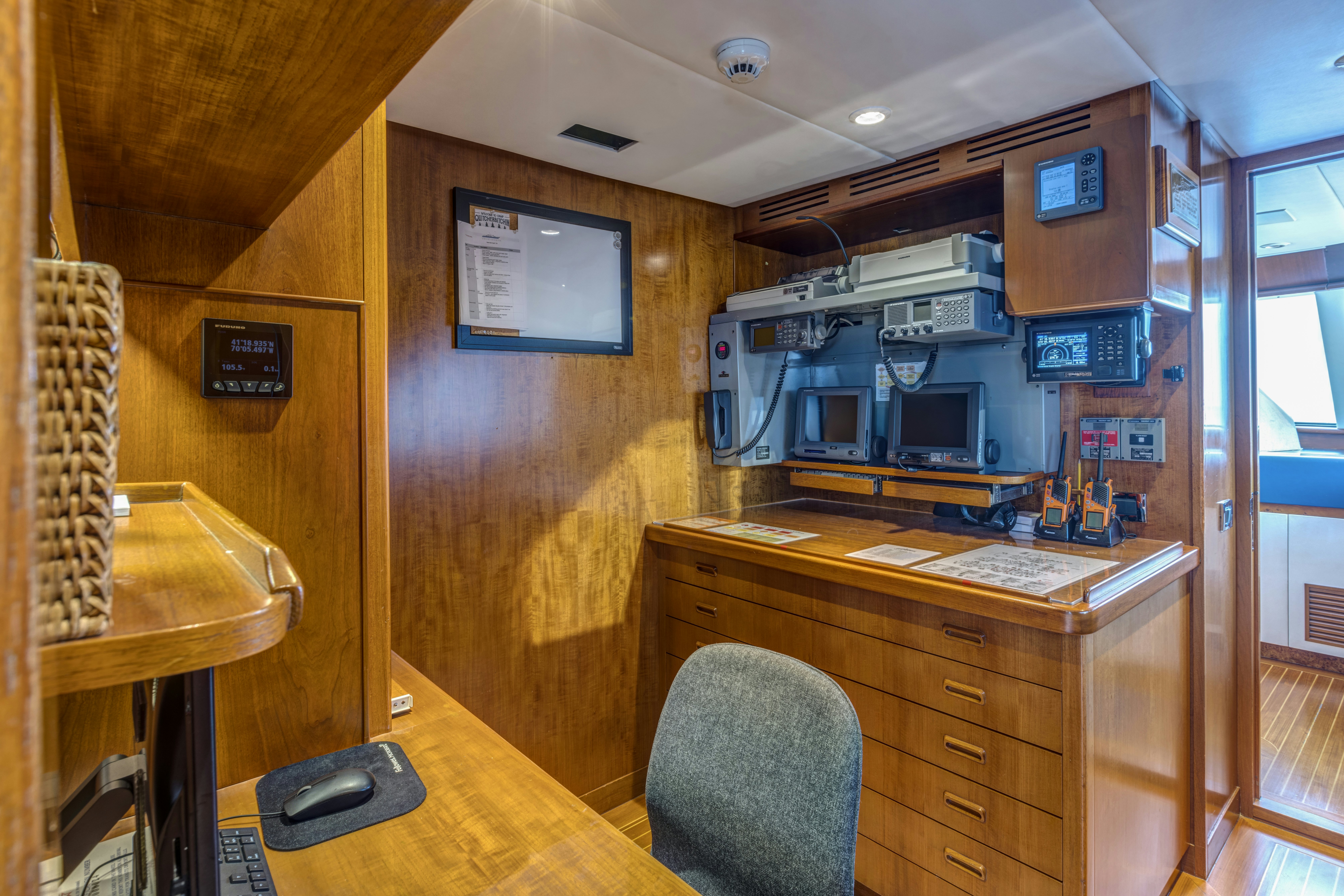 a room with a desk and computer aboard TRUE NORTH Yacht for Sale