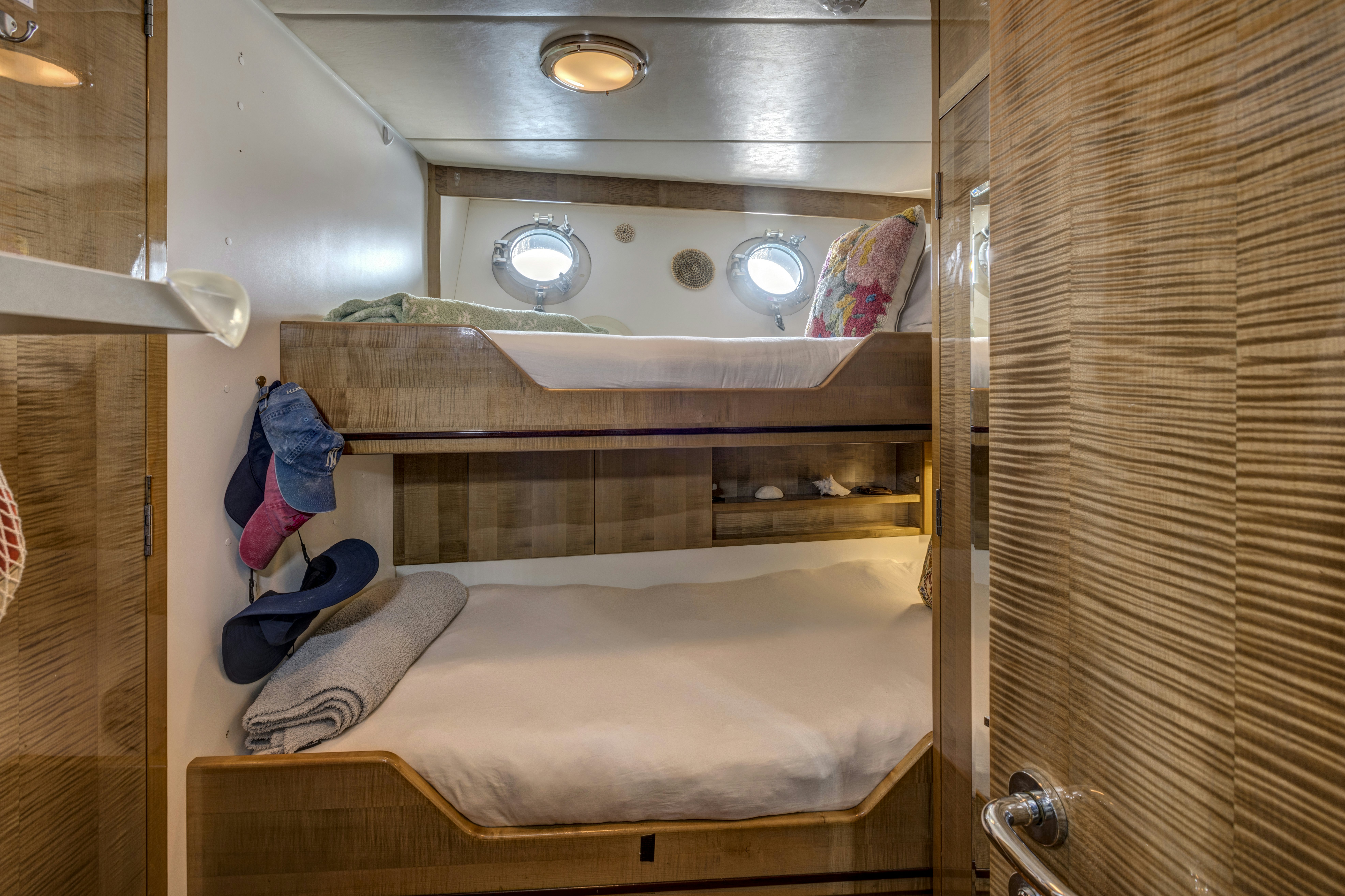 a metal shelf with a bed aboard TRUE NORTH Yacht for Sale