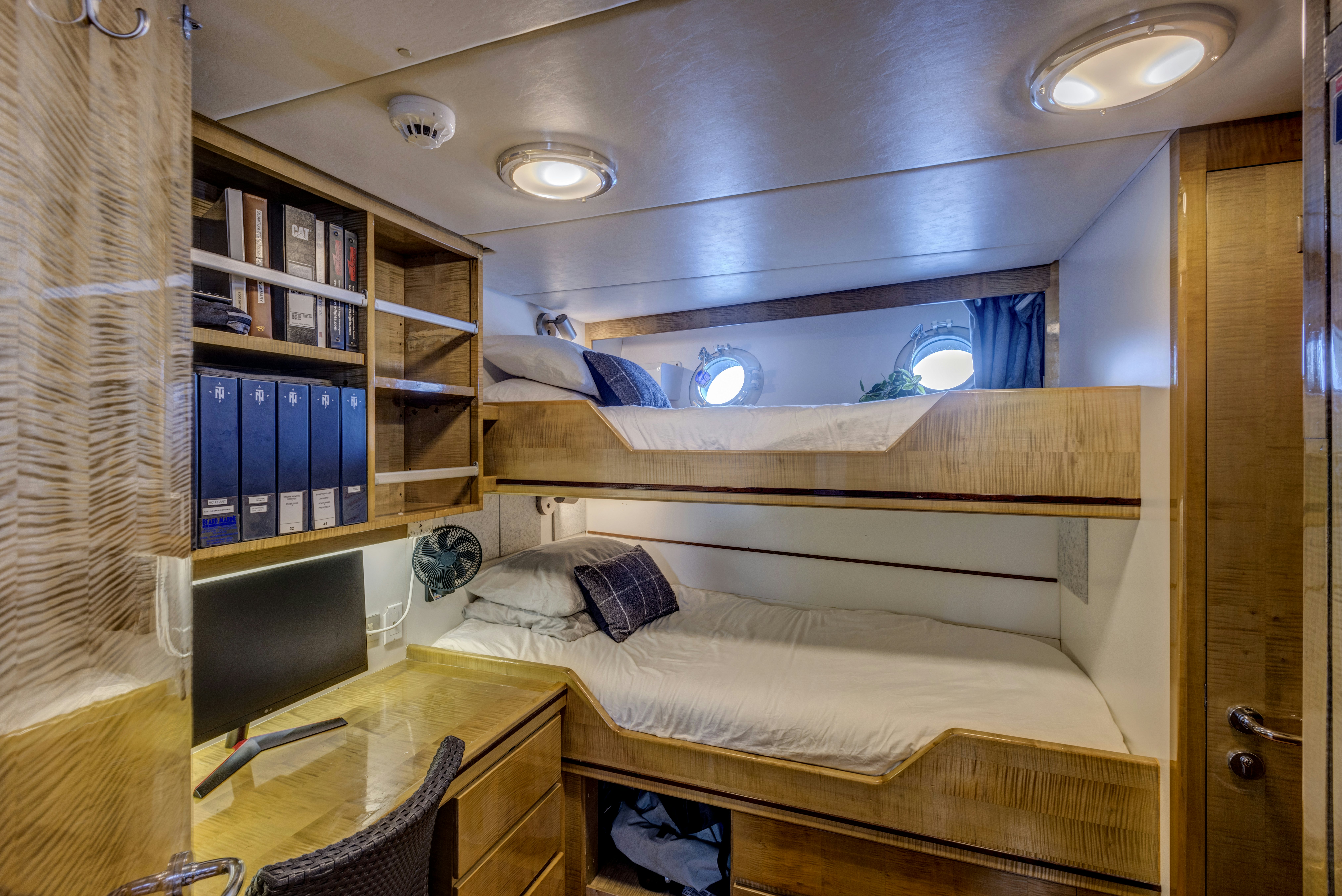 a room with bunk beds aboard TRUE NORTH Yacht for Sale