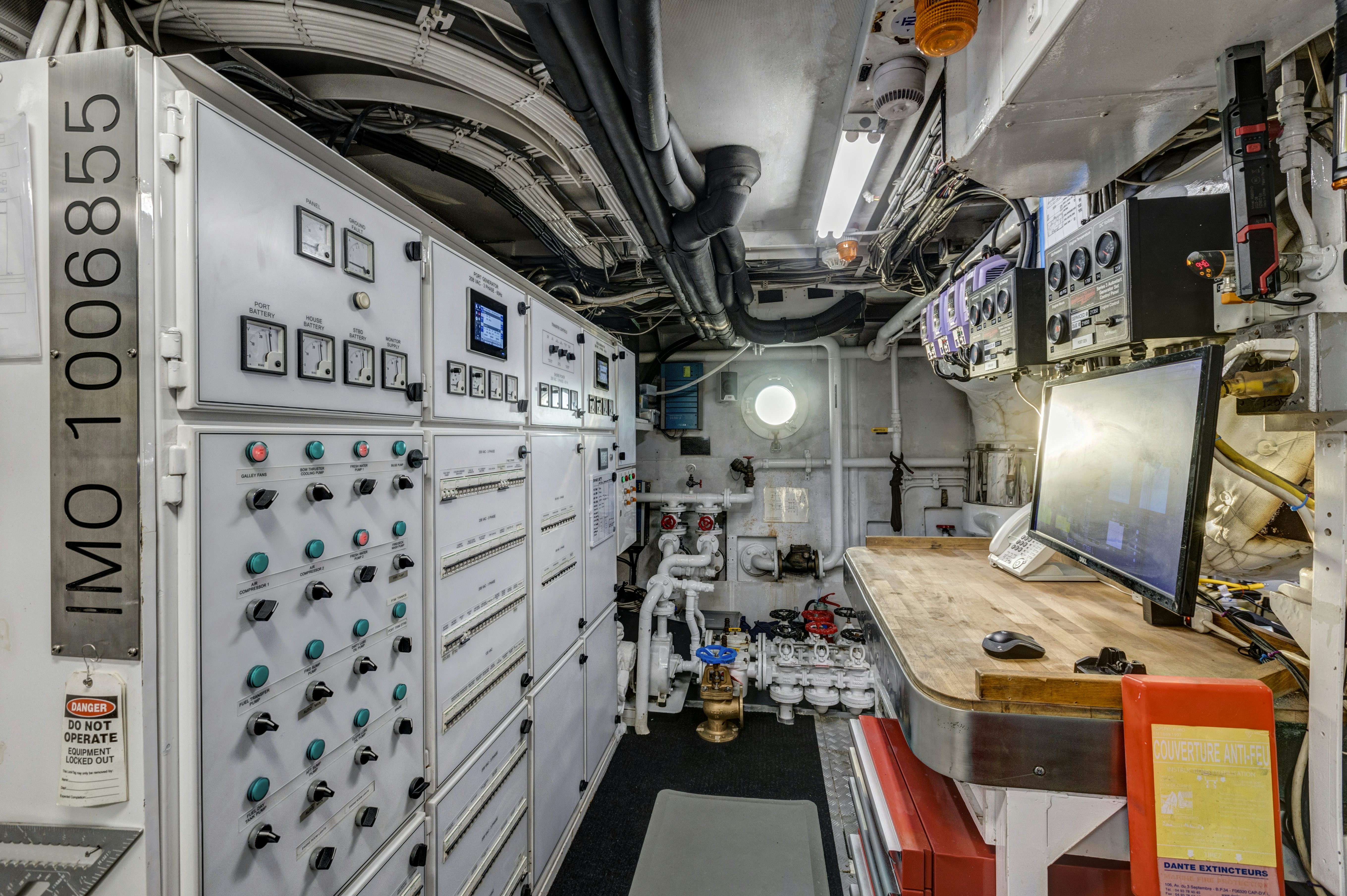 a room with machines and equipment aboard TRUE NORTH Yacht for Sale