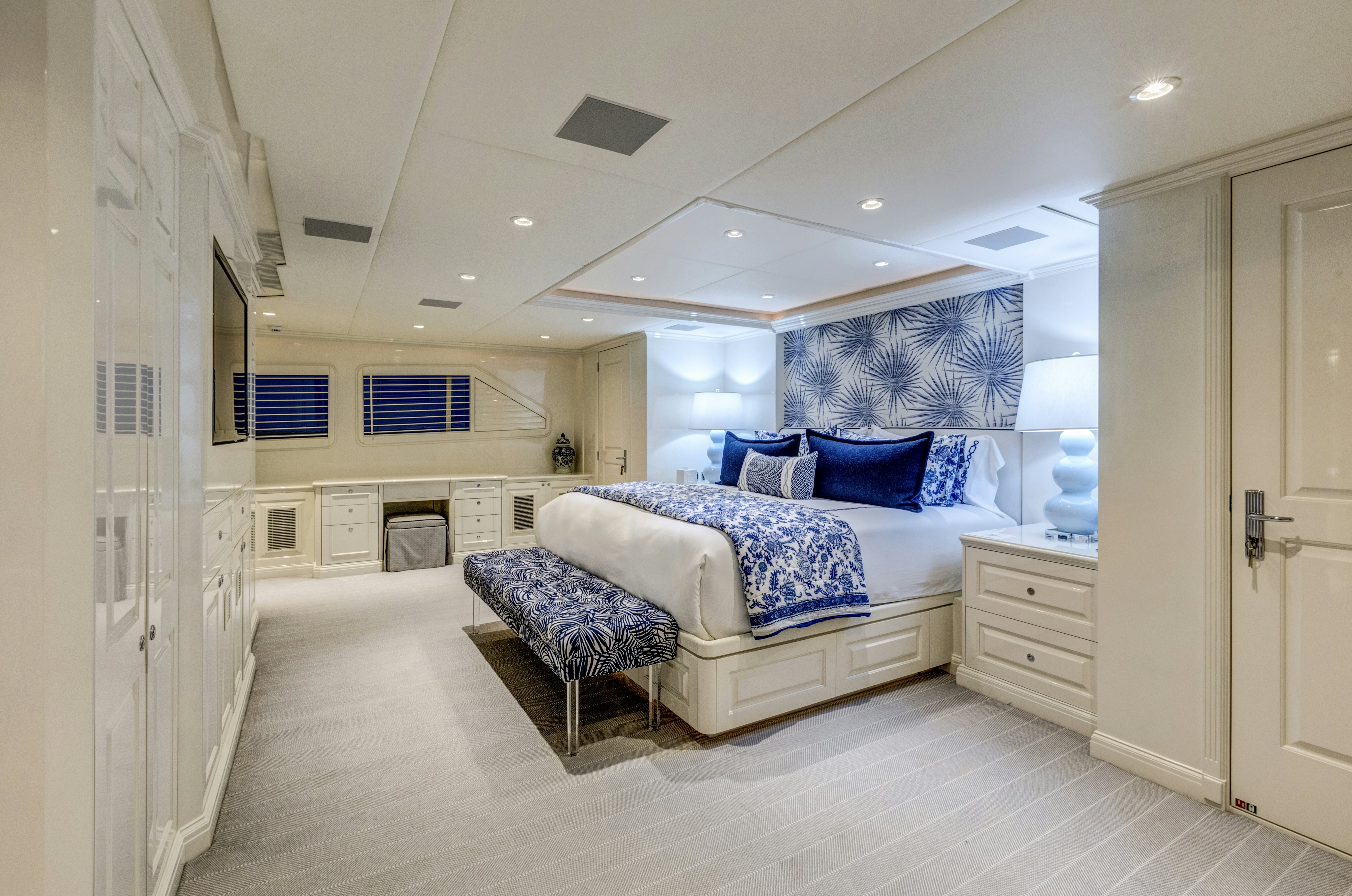 a large bedroom with a bed aboard TRUE NORTH Yacht for Sale