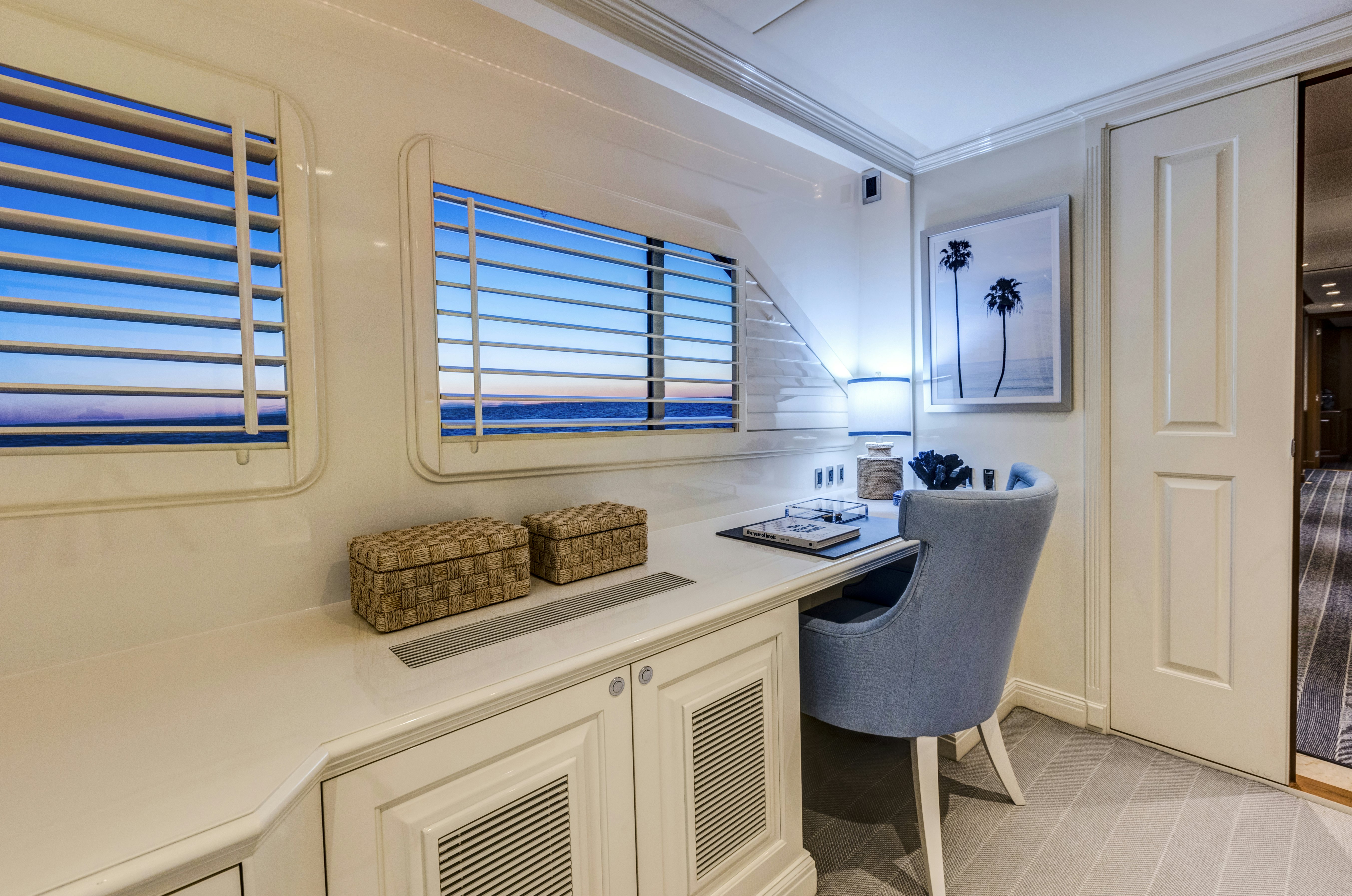 a room with a desk and a chair aboard TRUE NORTH Yacht for Sale