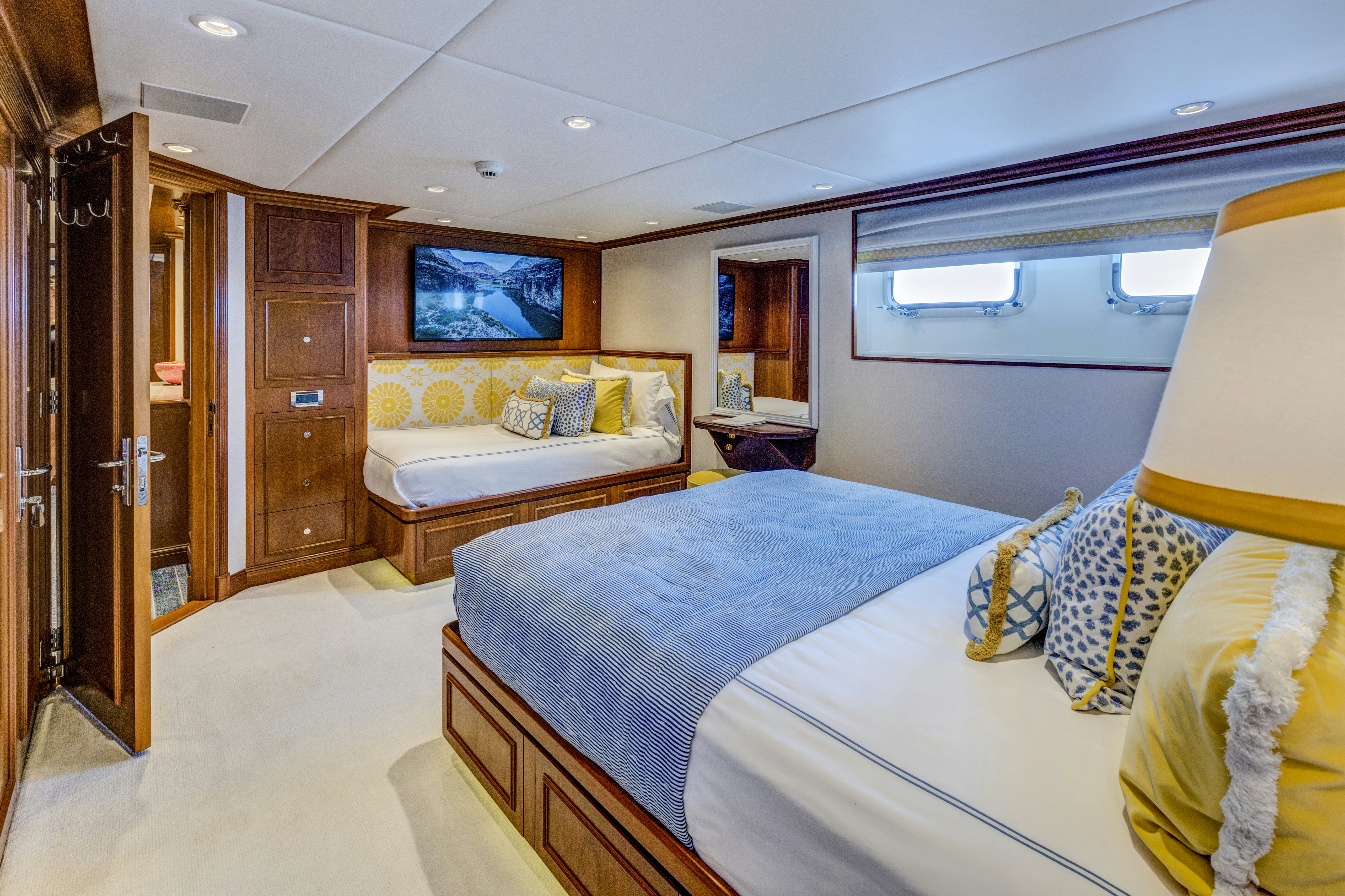 a room with two beds aboard TRUE NORTH Yacht for Sale