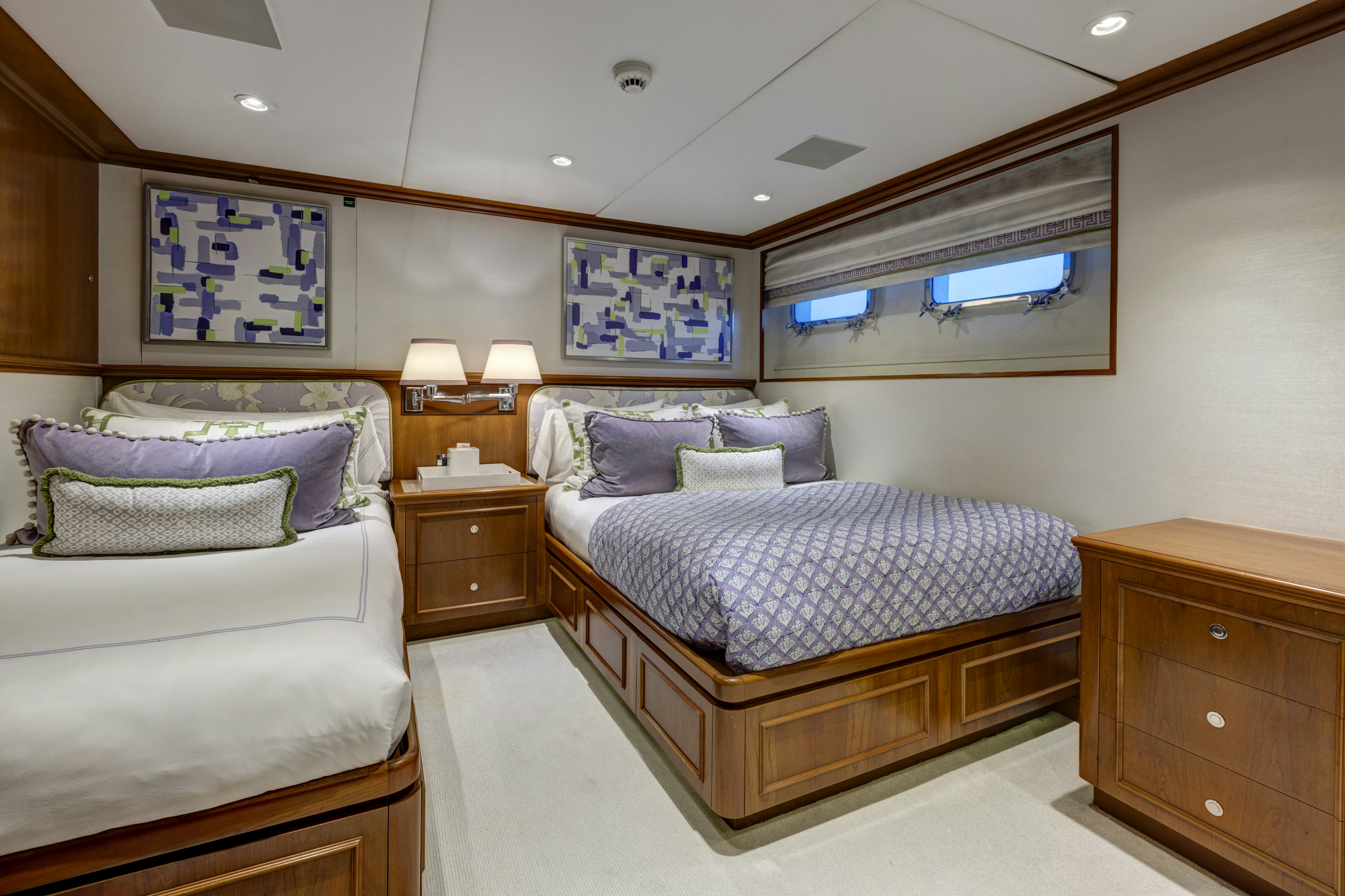 a couple of beds in a room aboard TRUE NORTH Yacht for Sale