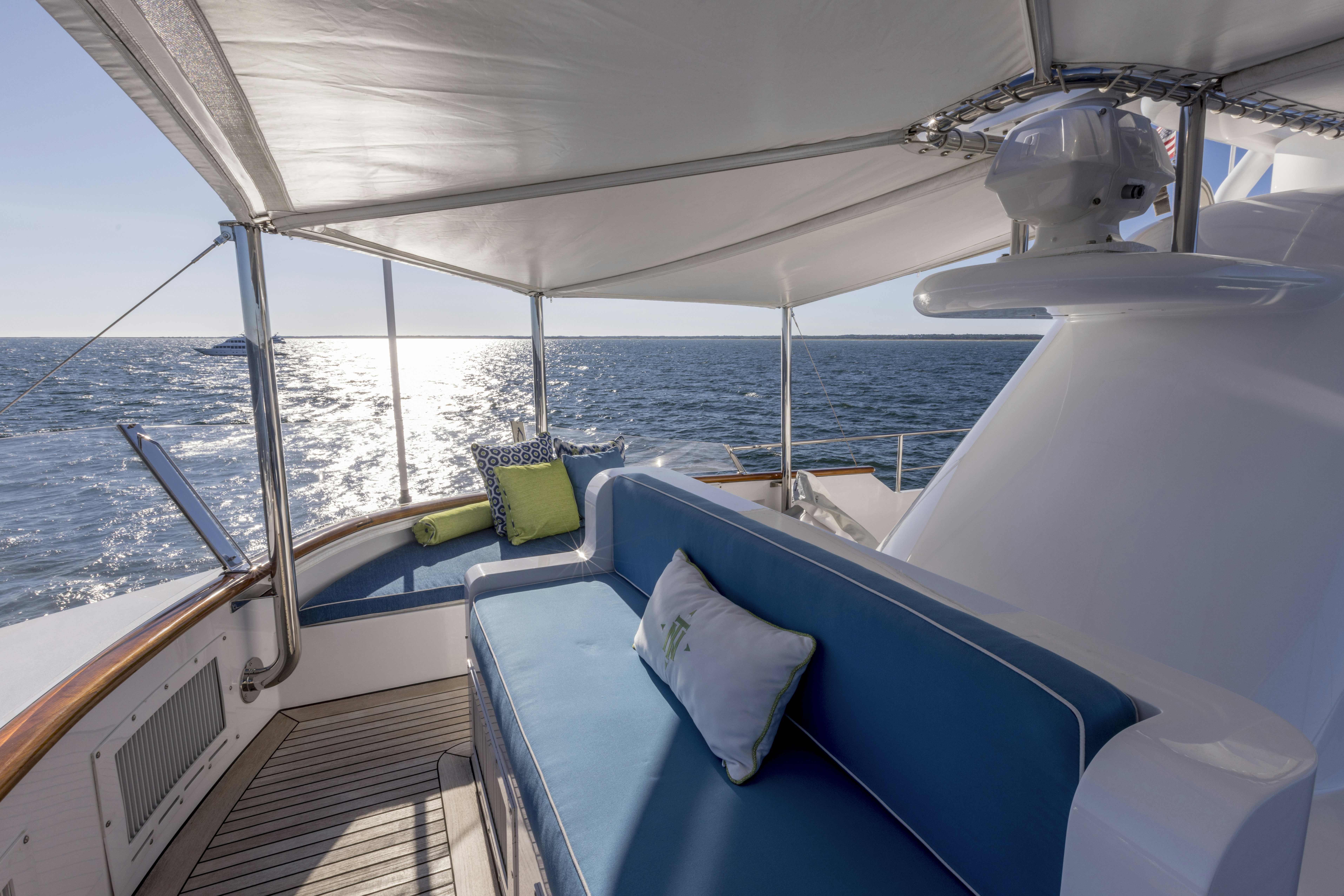 a boat with a seat and a pillow on the deck aboard TRUE NORTH Yacht for Sale